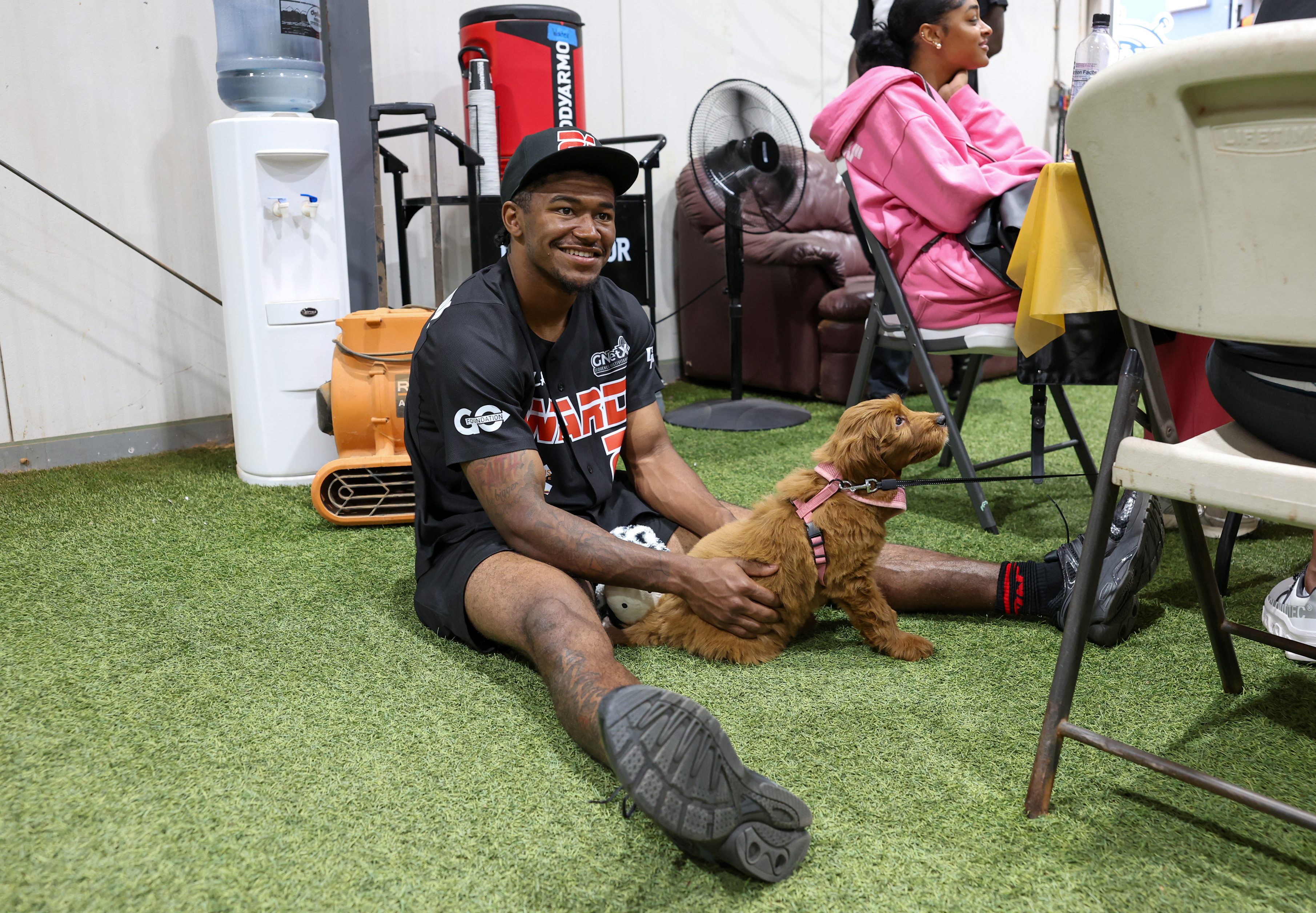 Photos from the Denzel Ward celebrity softball game, June 6,...