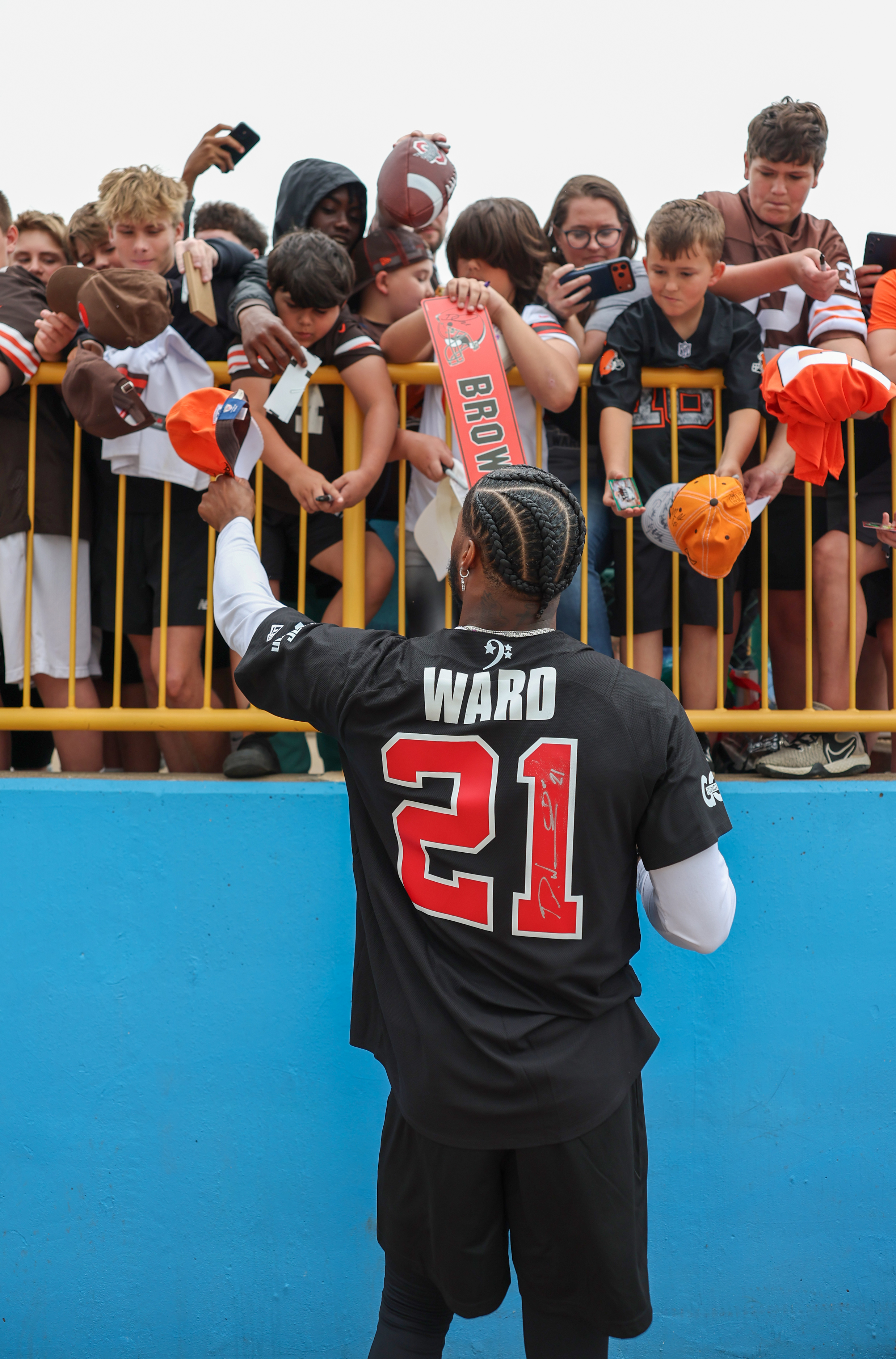 Photos from the Denzel Ward celebrity softball game, June 6,...