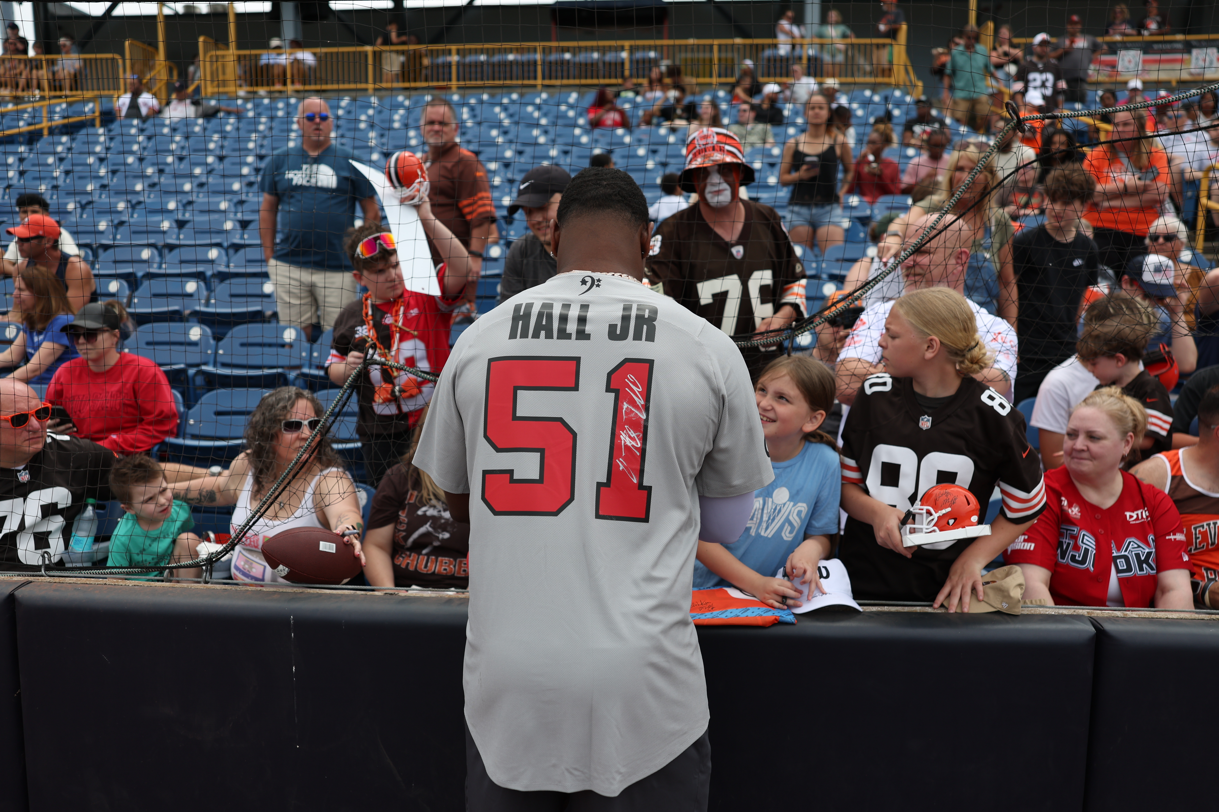 Photos from the Denzel Ward celebrity softball game, June 6,...