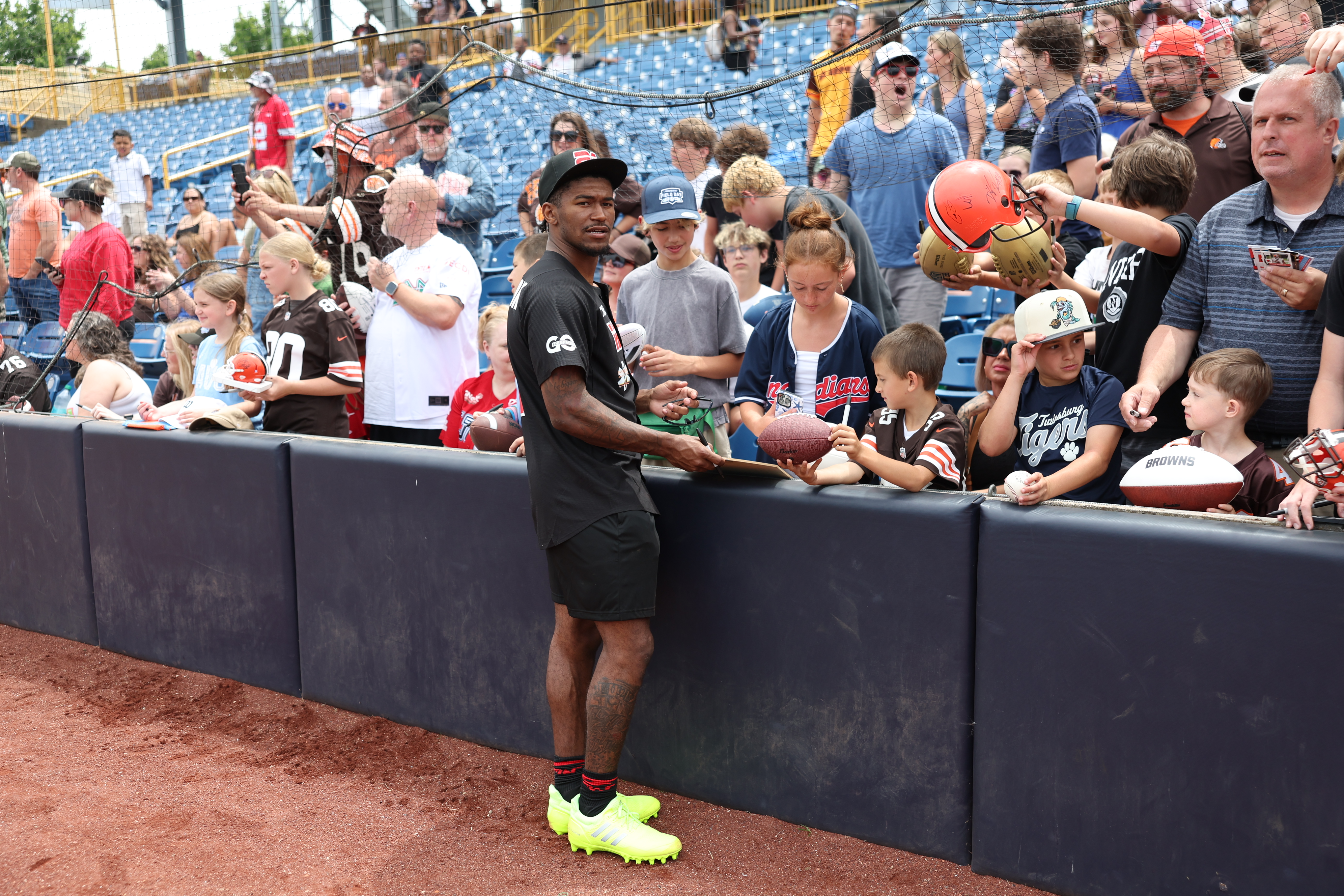Photos from the Denzel Ward celebrity softball game, June 6,...