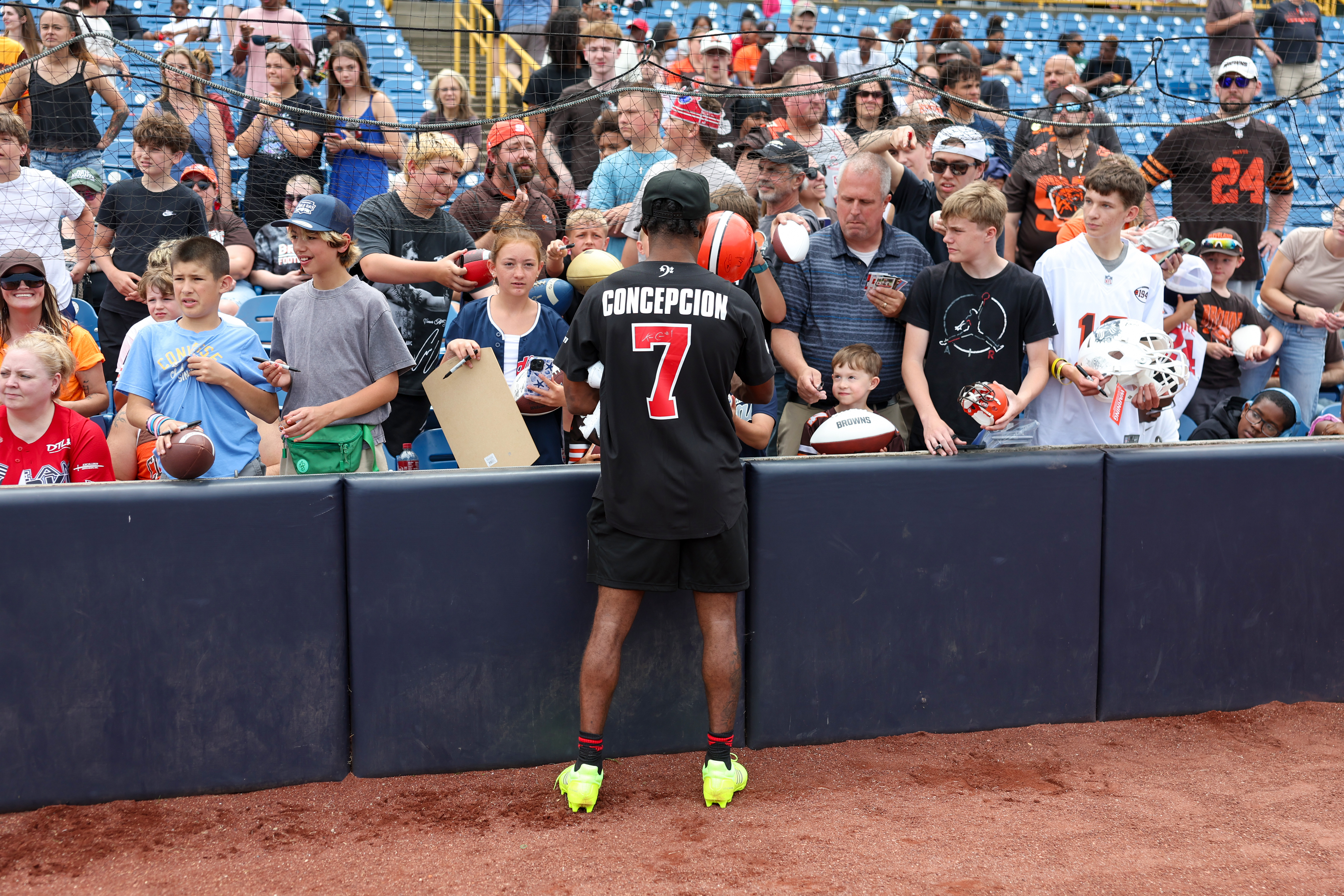 Photos from the Denzel Ward celebrity softball game, June 6,...