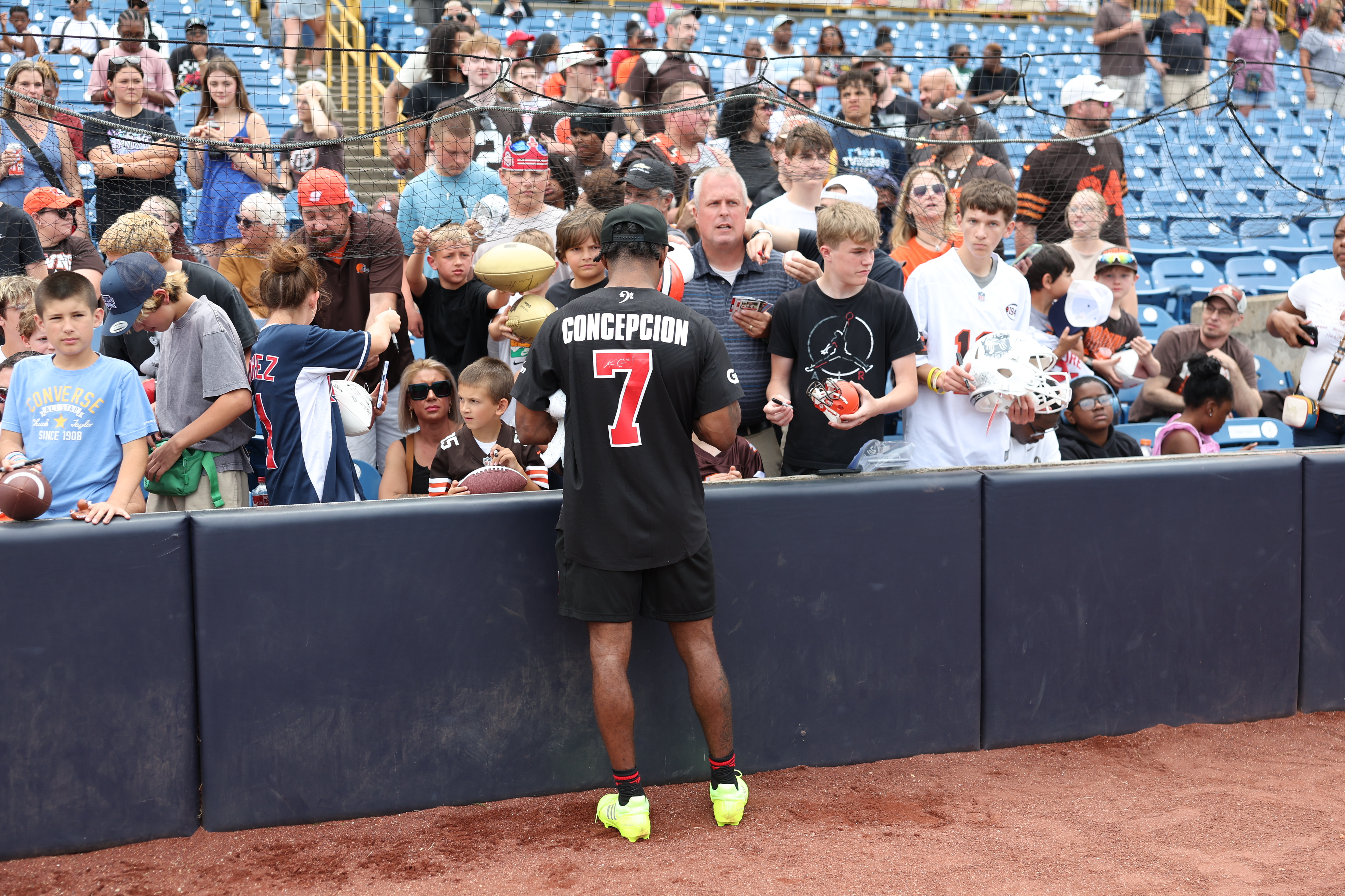Photos from the Denzel Ward celebrity softball game, June 6,...