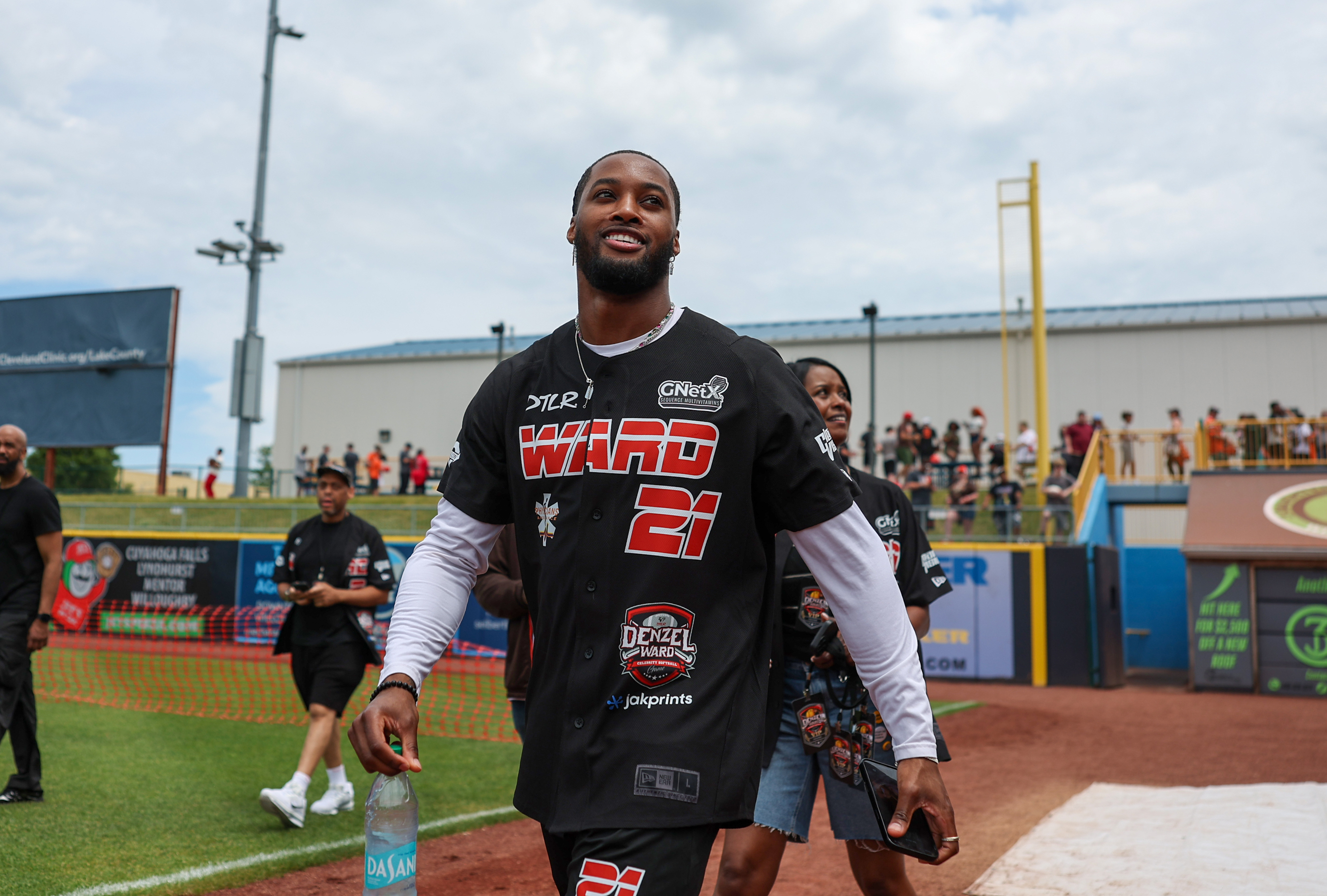 Photos from the Denzel Ward celebrity softball game, June 6,...