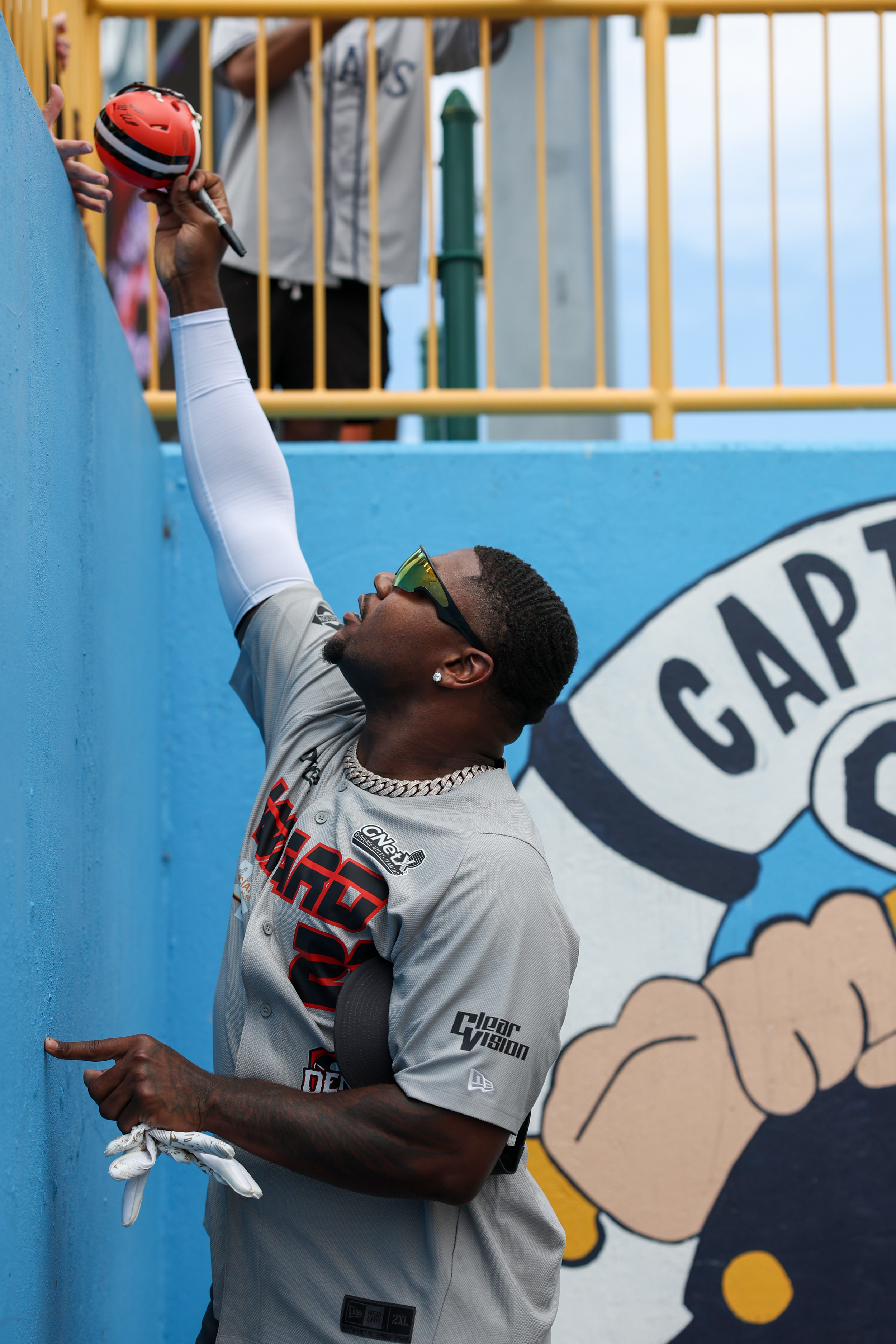Photos from the Denzel Ward celebrity softball game, June 6,...