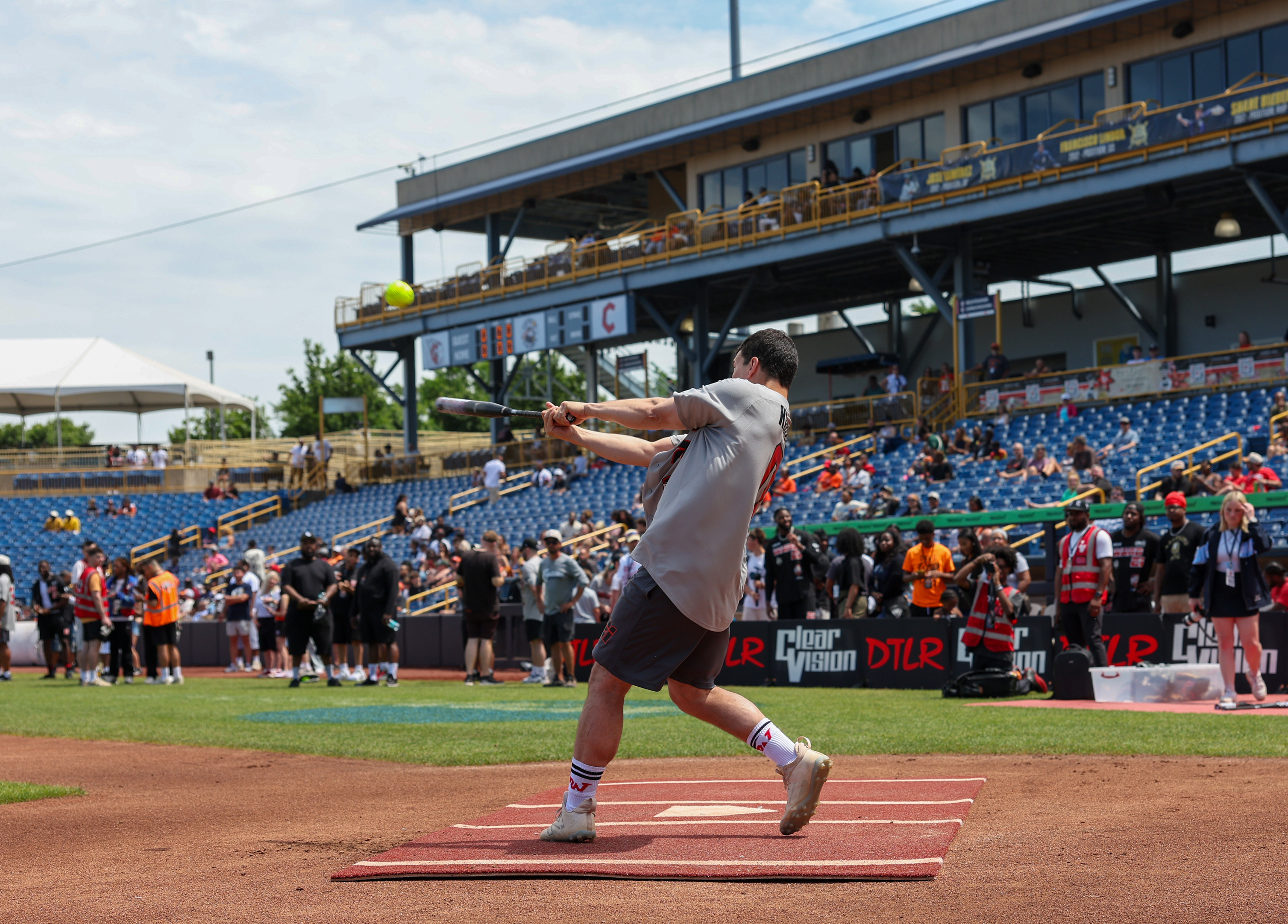 Photos from the Denzel Ward celebrity softball game, June 6,...