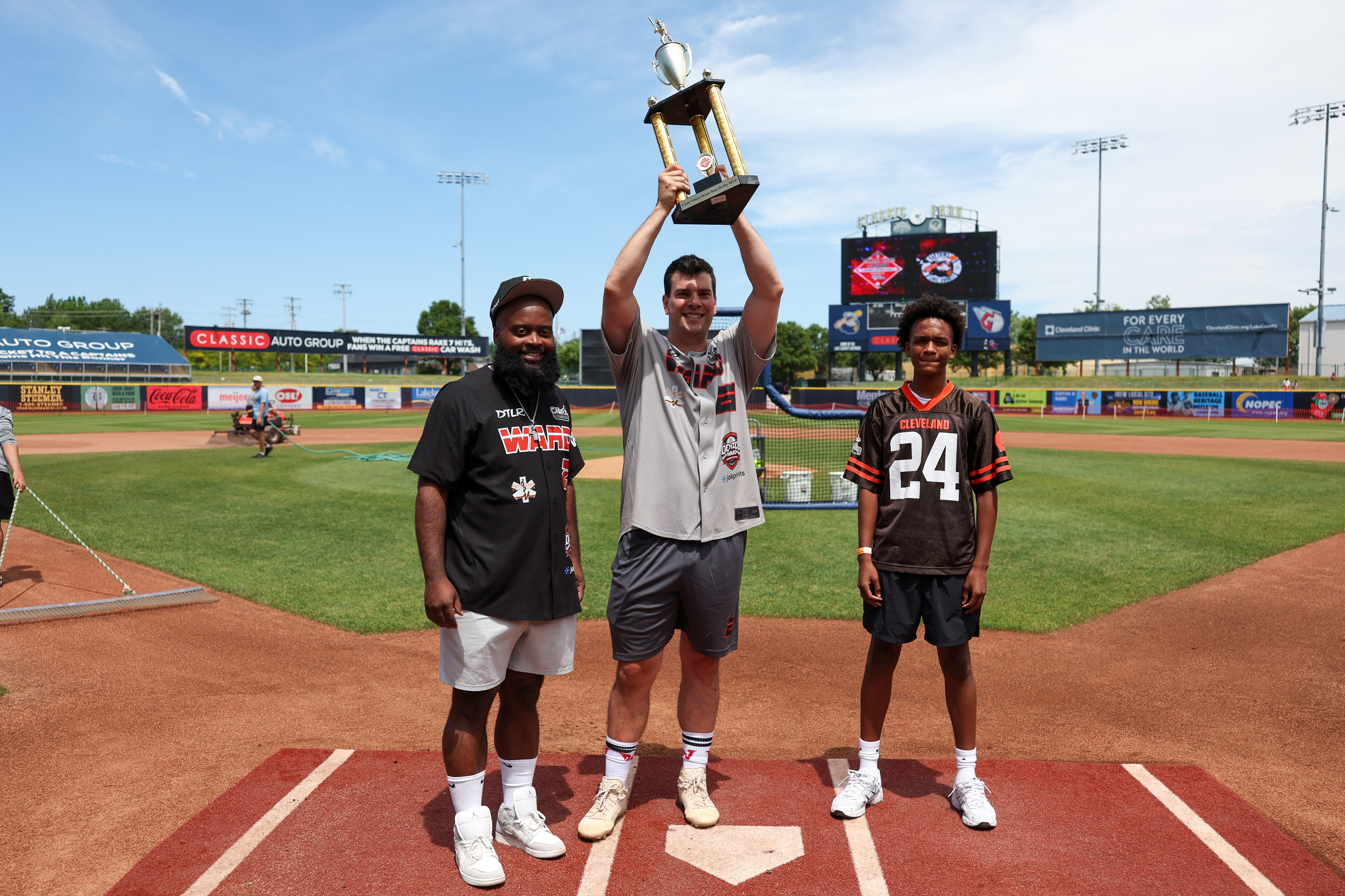 Photos from the Denzel Ward celebrity softball game, June 6,...