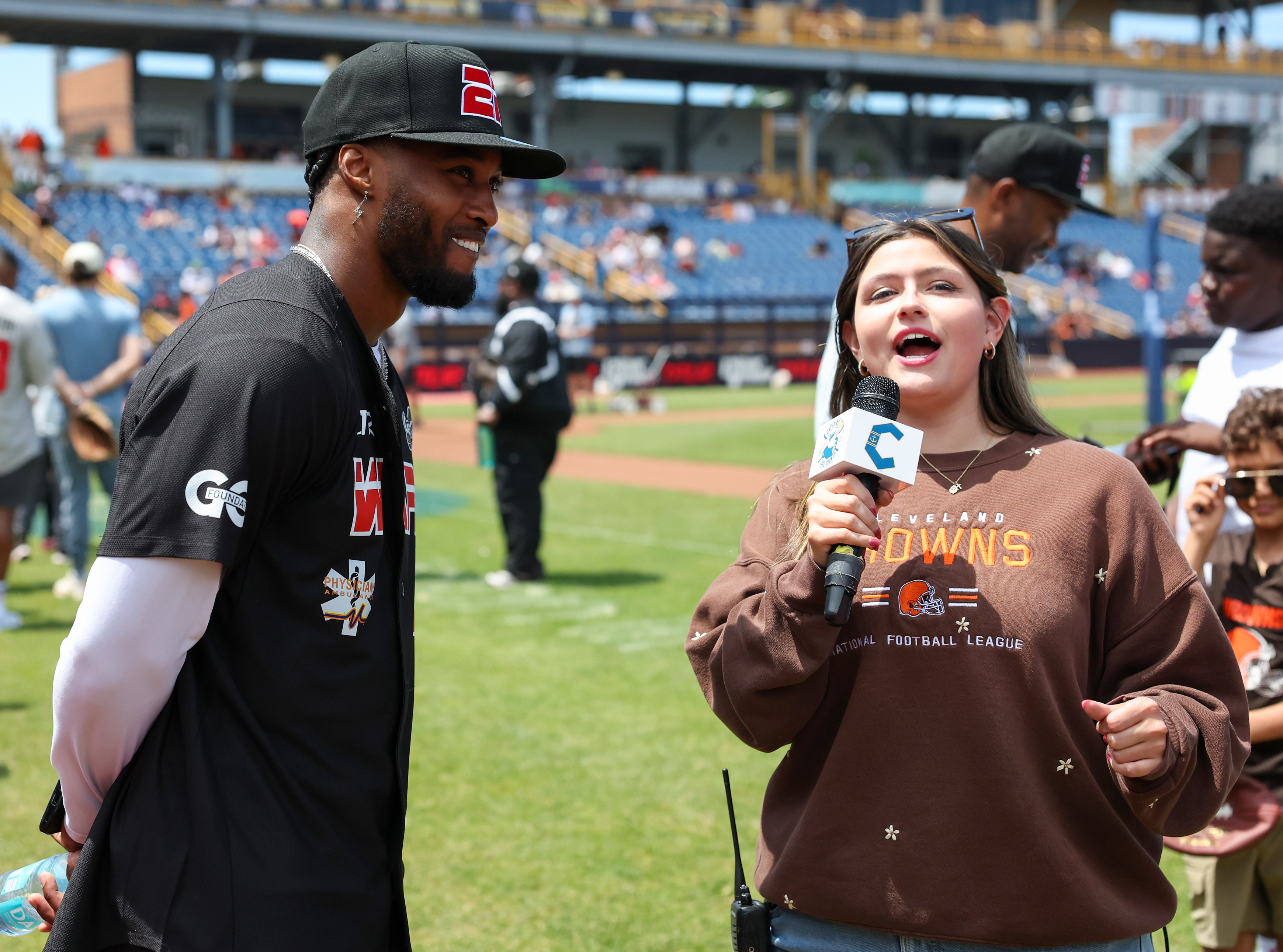 Photos from the Denzel Ward celebrity softball game, June 6,...