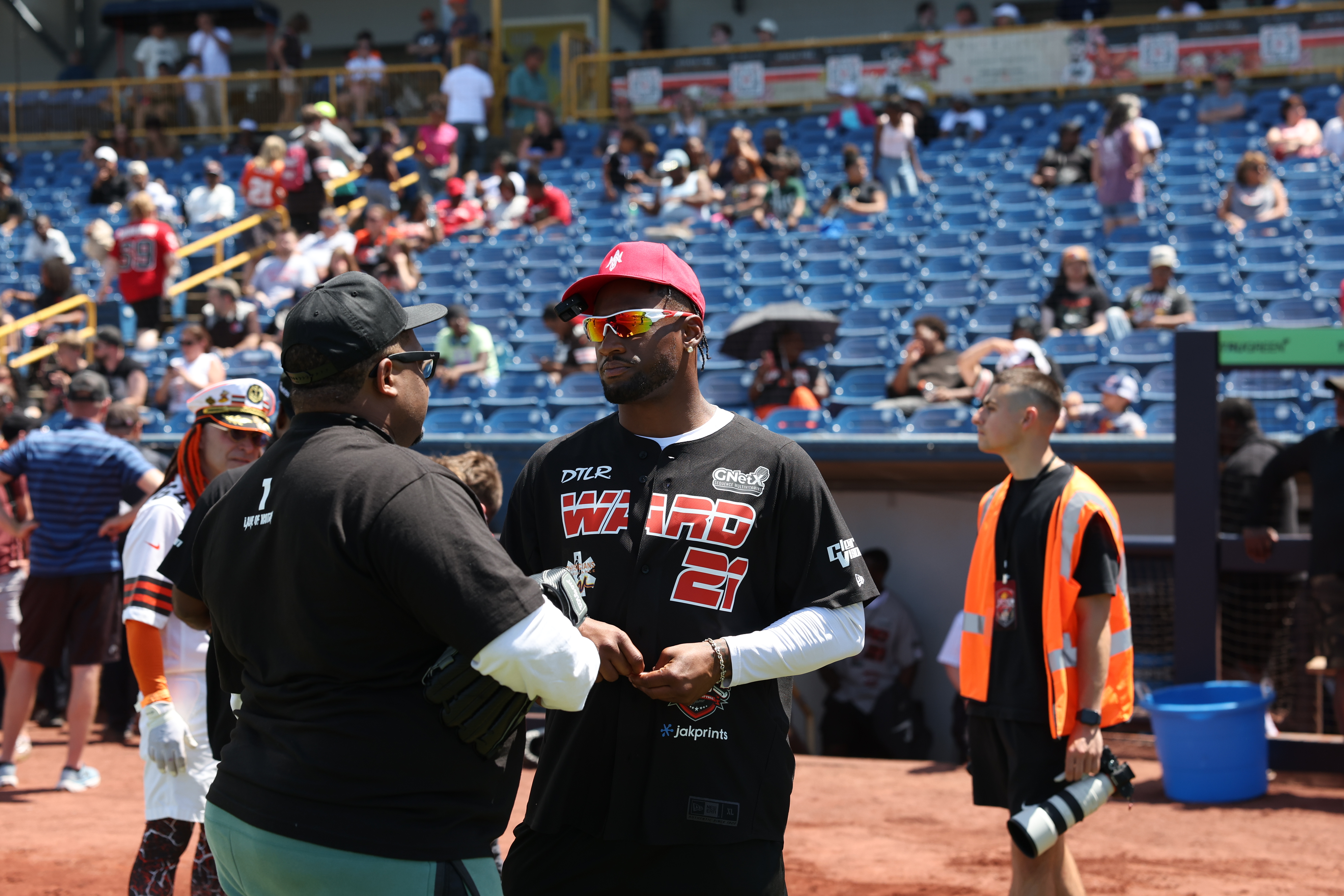 Photos from the Denzel Ward celebrity softball game, June 6,...