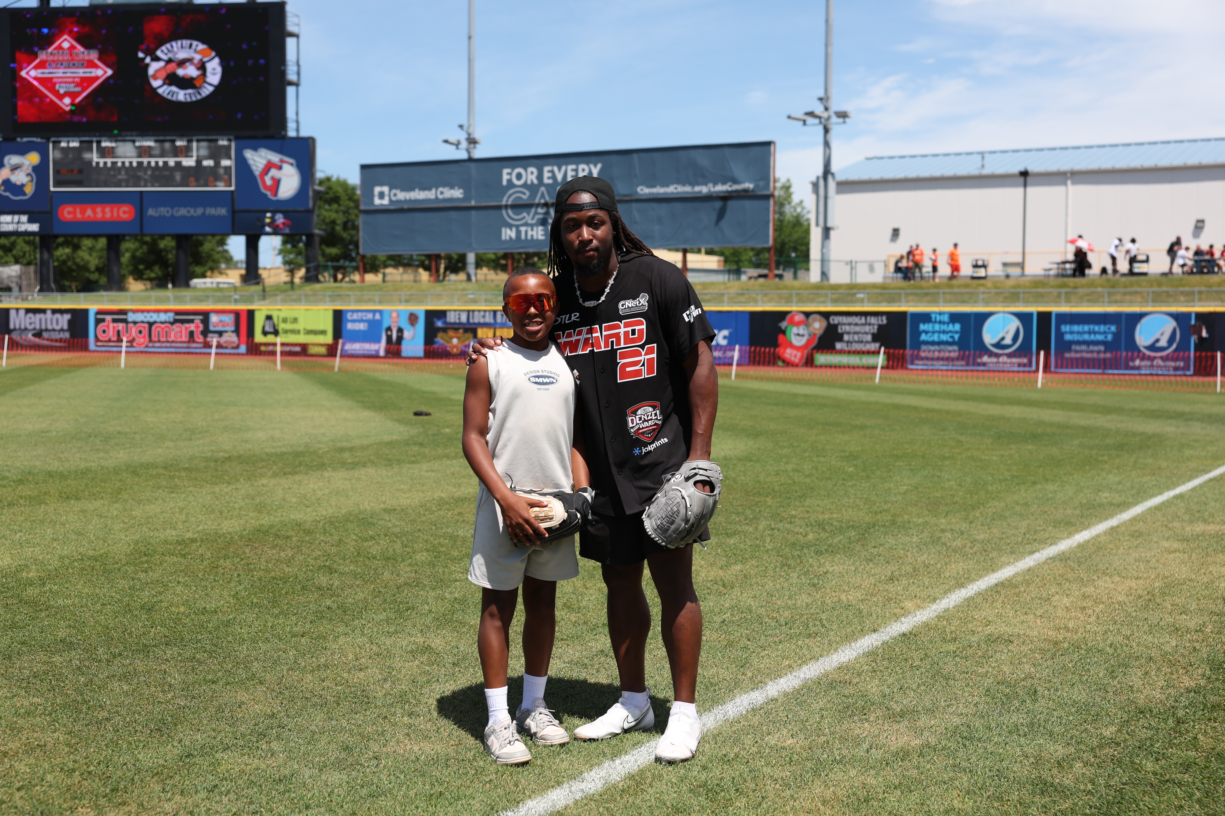 Photos from the Denzel Ward celebrity softball game, June 6,...