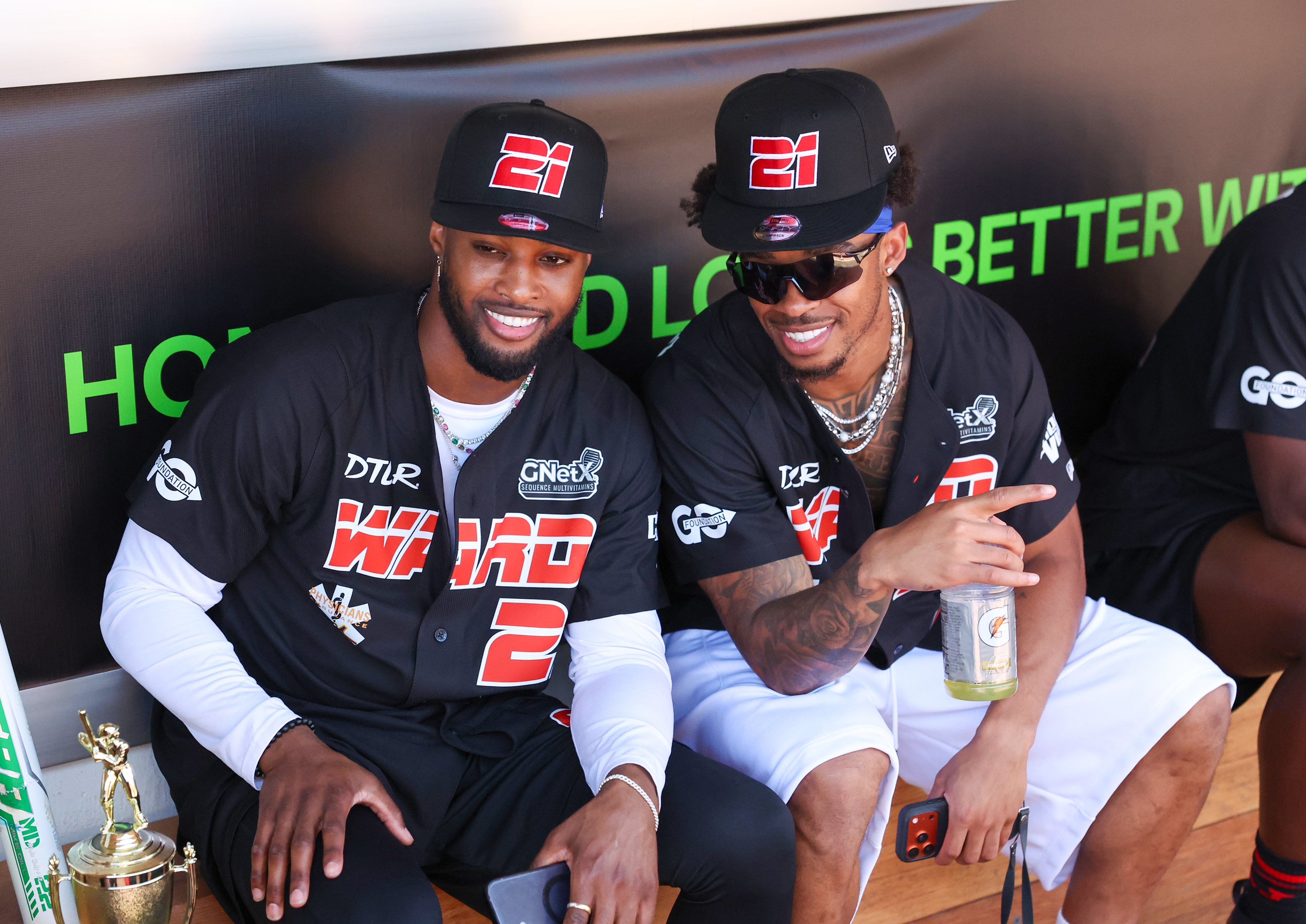 Photos from the Denzel Ward celebrity softball game, June 6,...