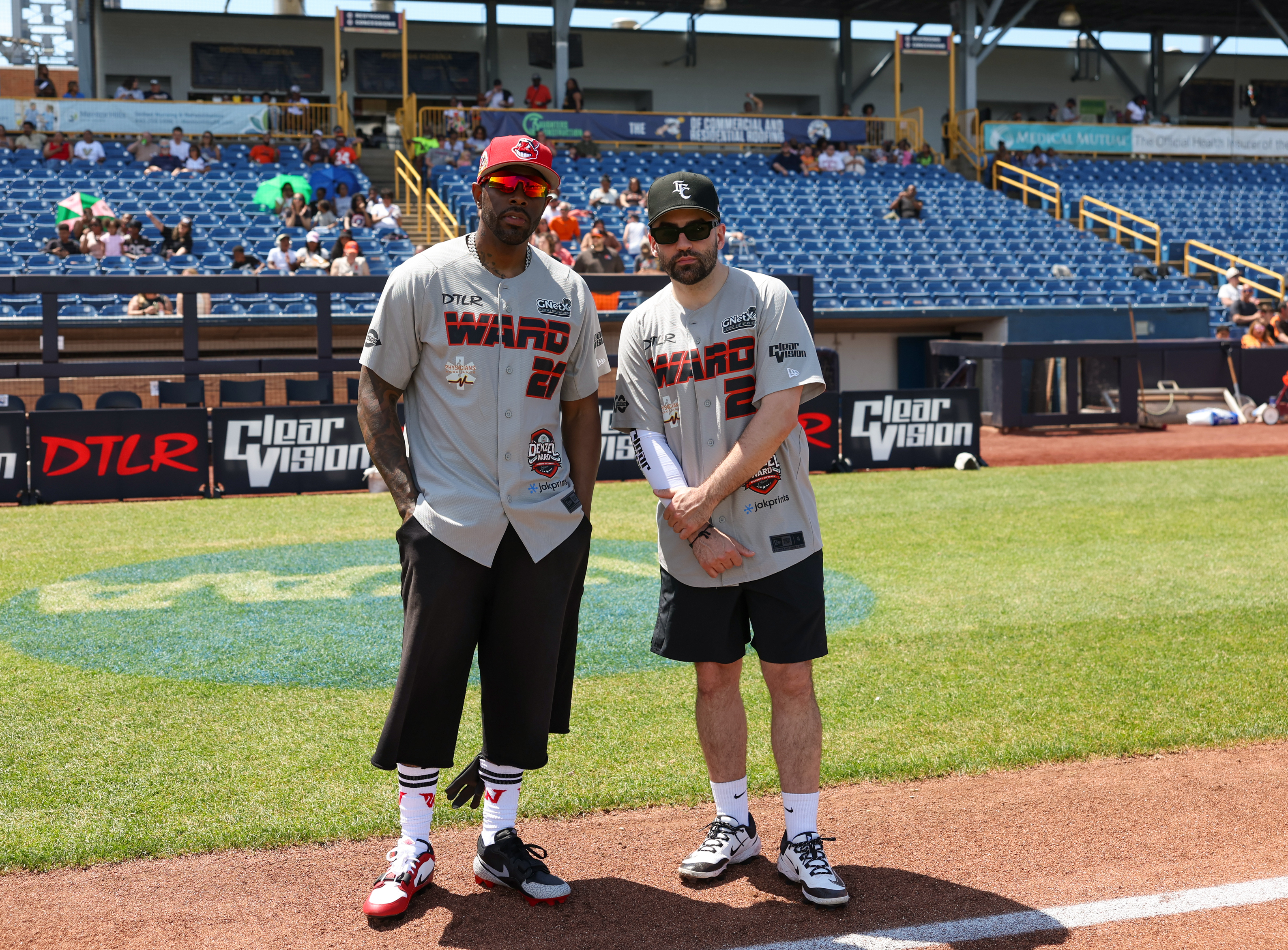 Photos from the Denzel Ward celebrity softball game, June 6,...