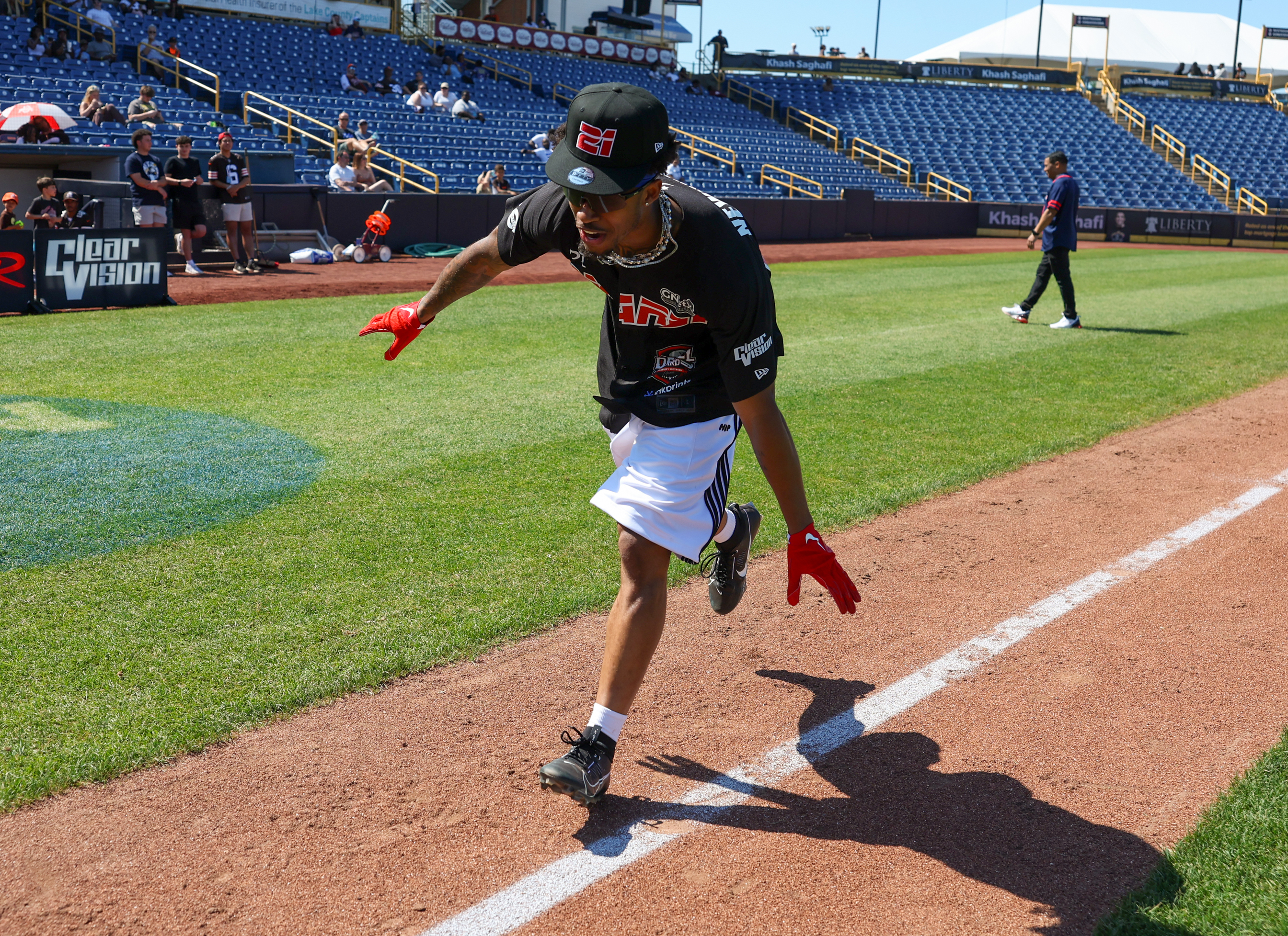 Photos from the Denzel Ward celebrity softball game, June 6,...