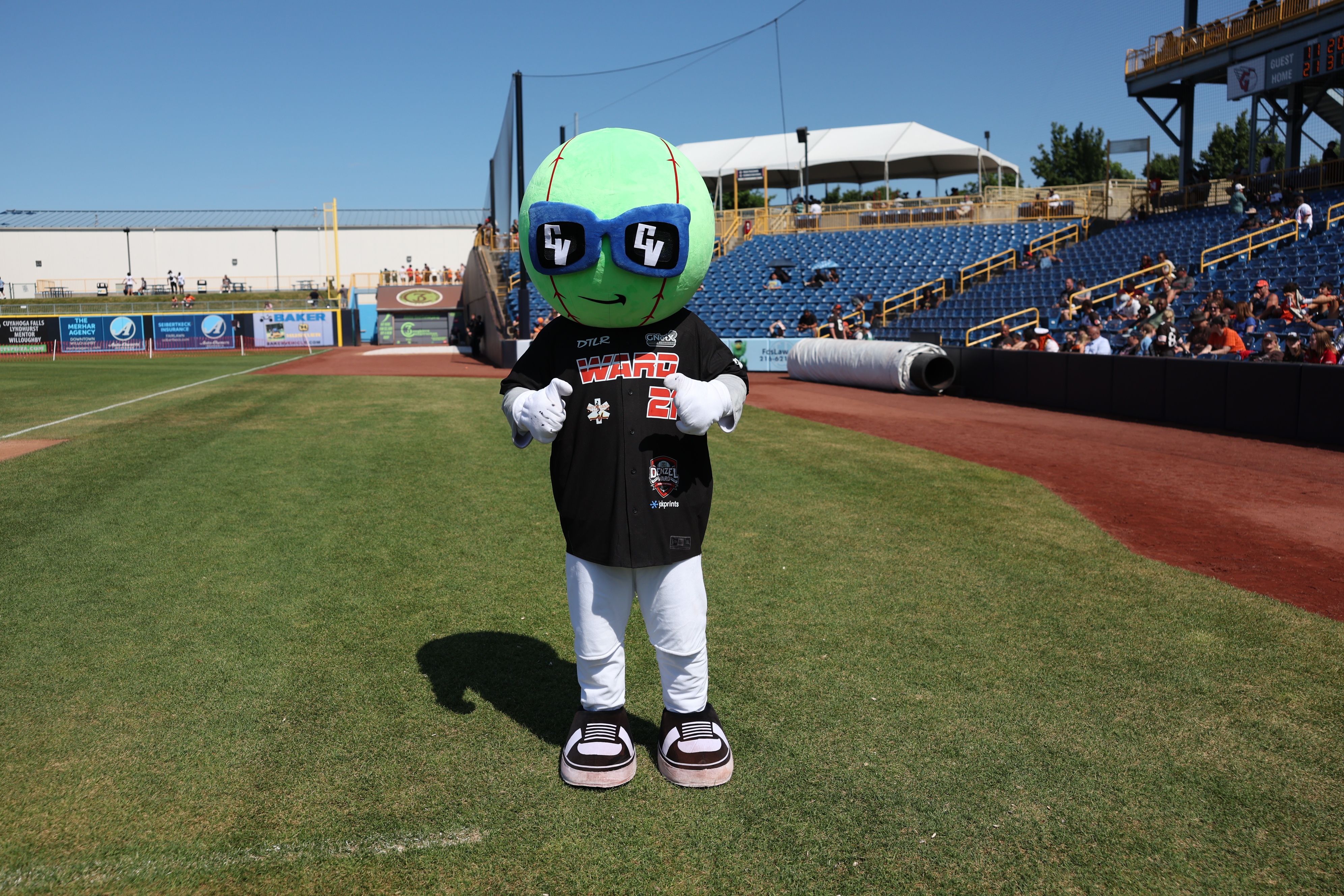 Photos from the Denzel Ward celebrity softball game, June 6,...
