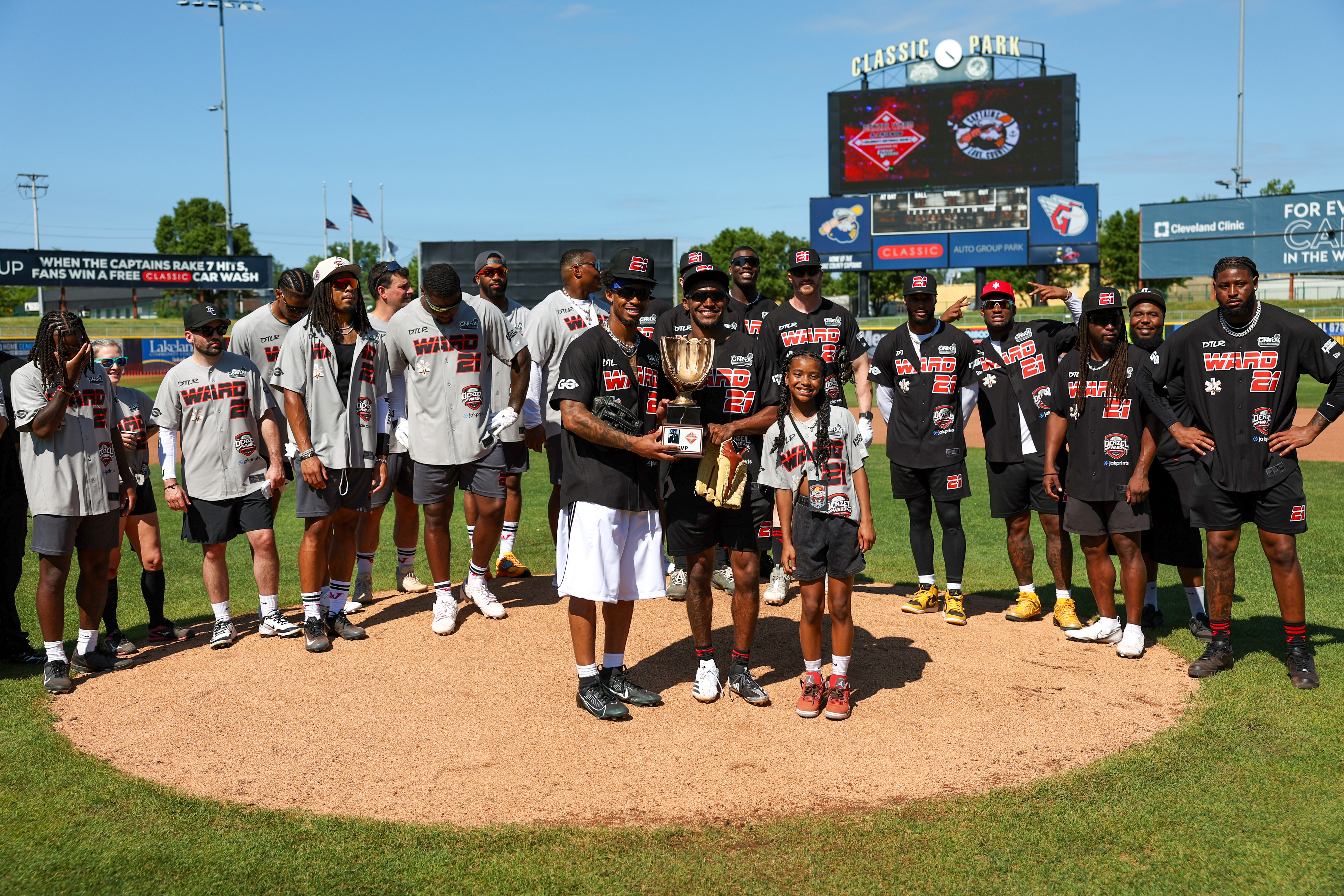 Photos from the Denzel Ward celebrity softball game, June 6,...