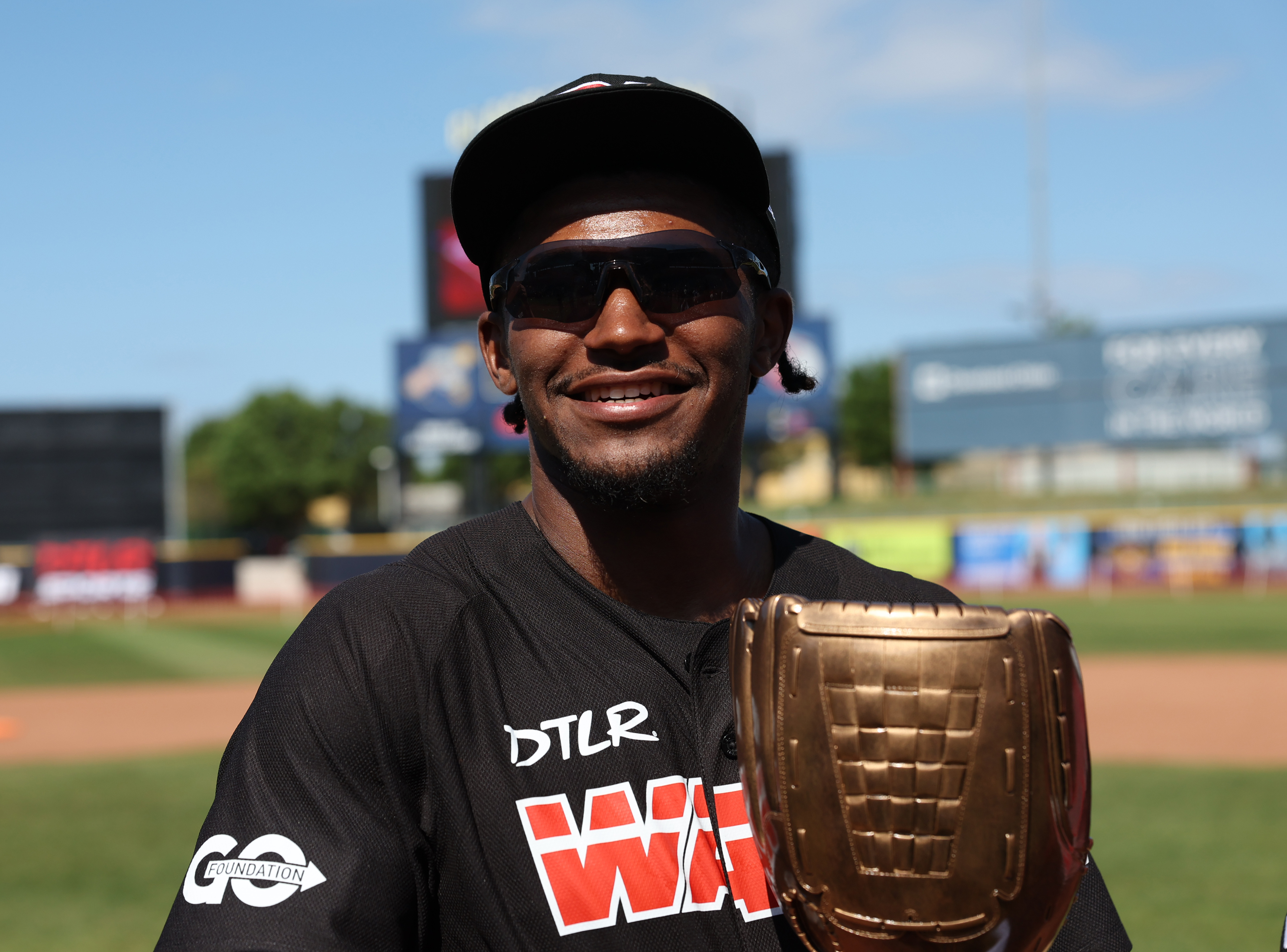 Photos from the Denzel Ward celebrity softball game, June 6,...