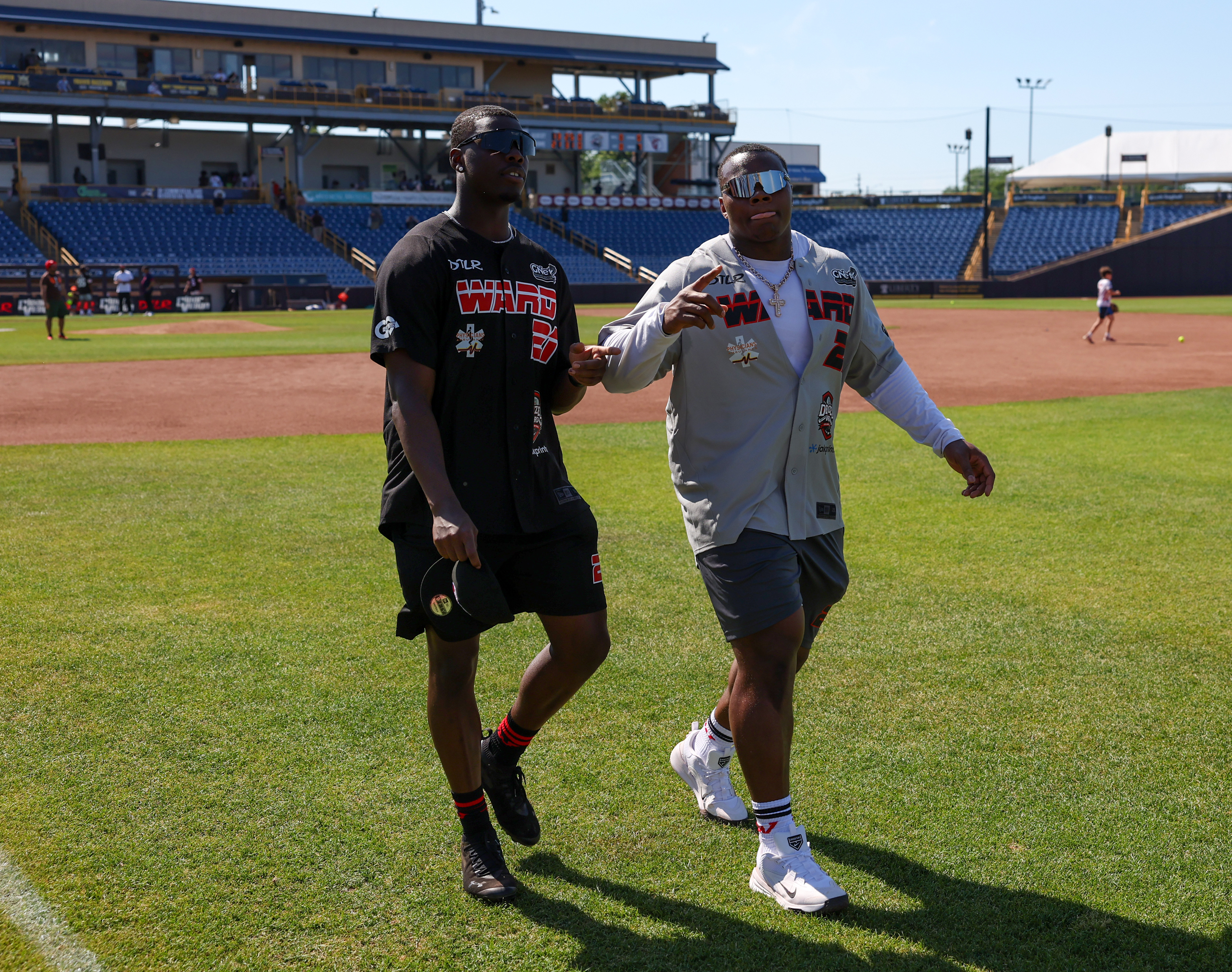 Photos from the Denzel Ward celebrity softball game, June 6,...
