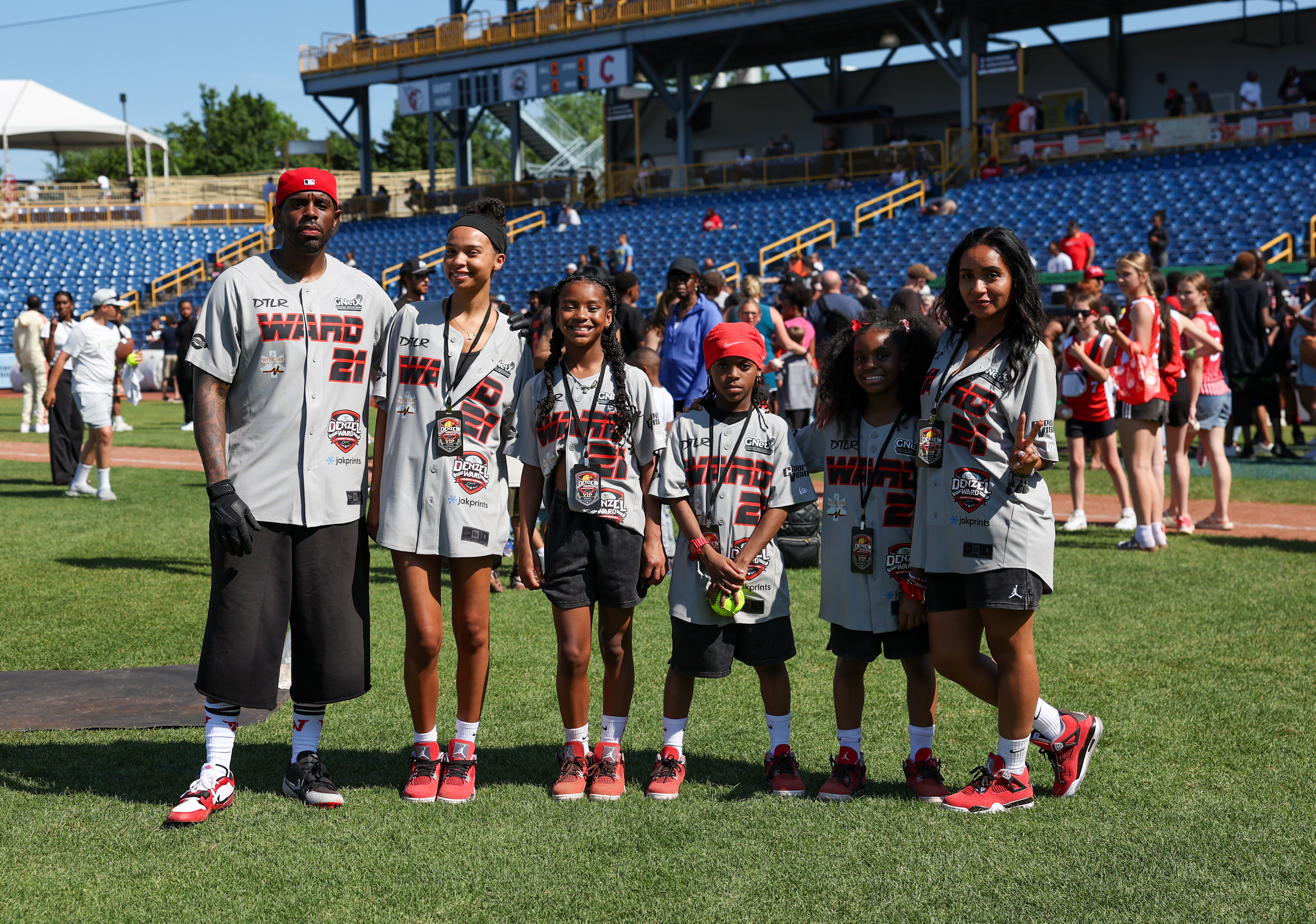 Photos from the Denzel Ward celebrity softball game, June 6,...