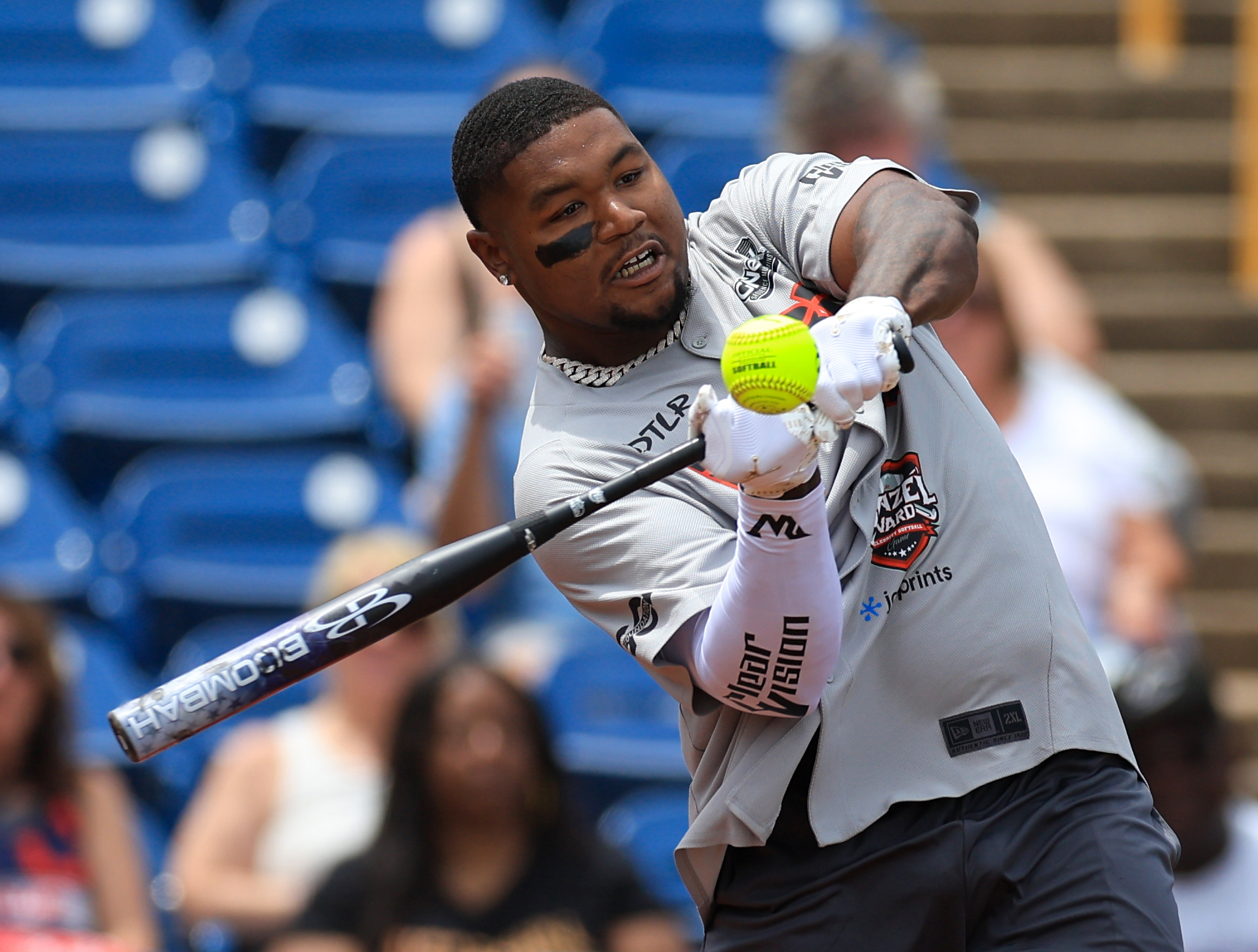 Photos from the Denzel Ward celebrity softball game, June 6,...