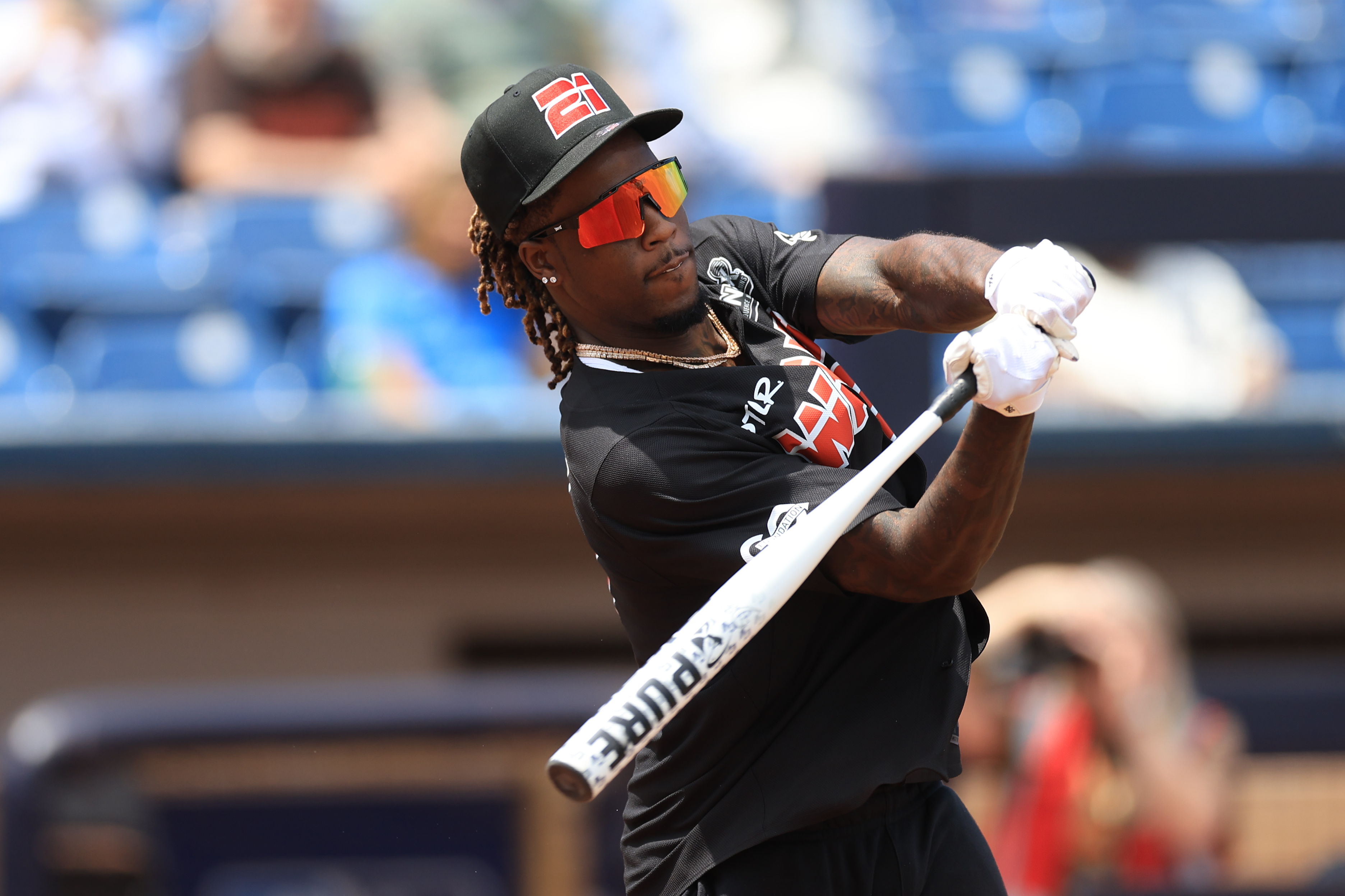 Photos from the Denzel Ward celebrity softball game, June 6,...
