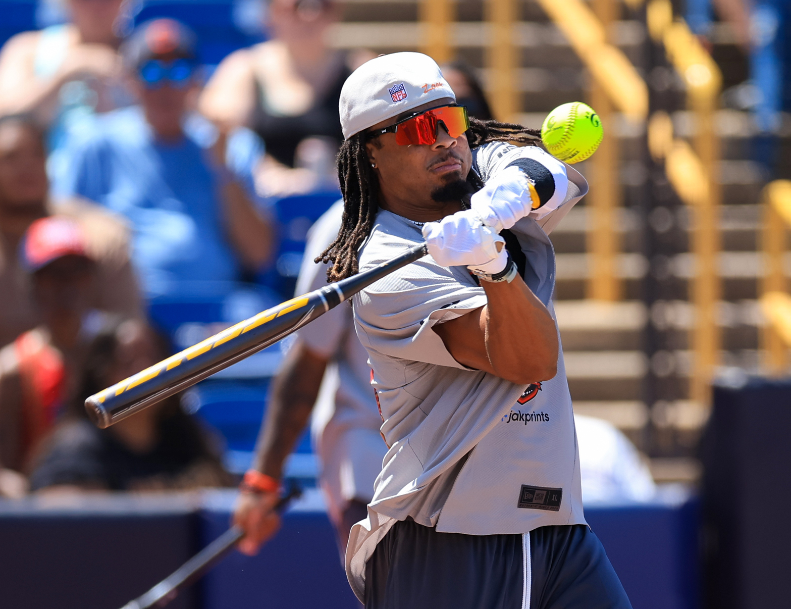 Photos from the Denzel Ward celebrity softball game, June 6,...