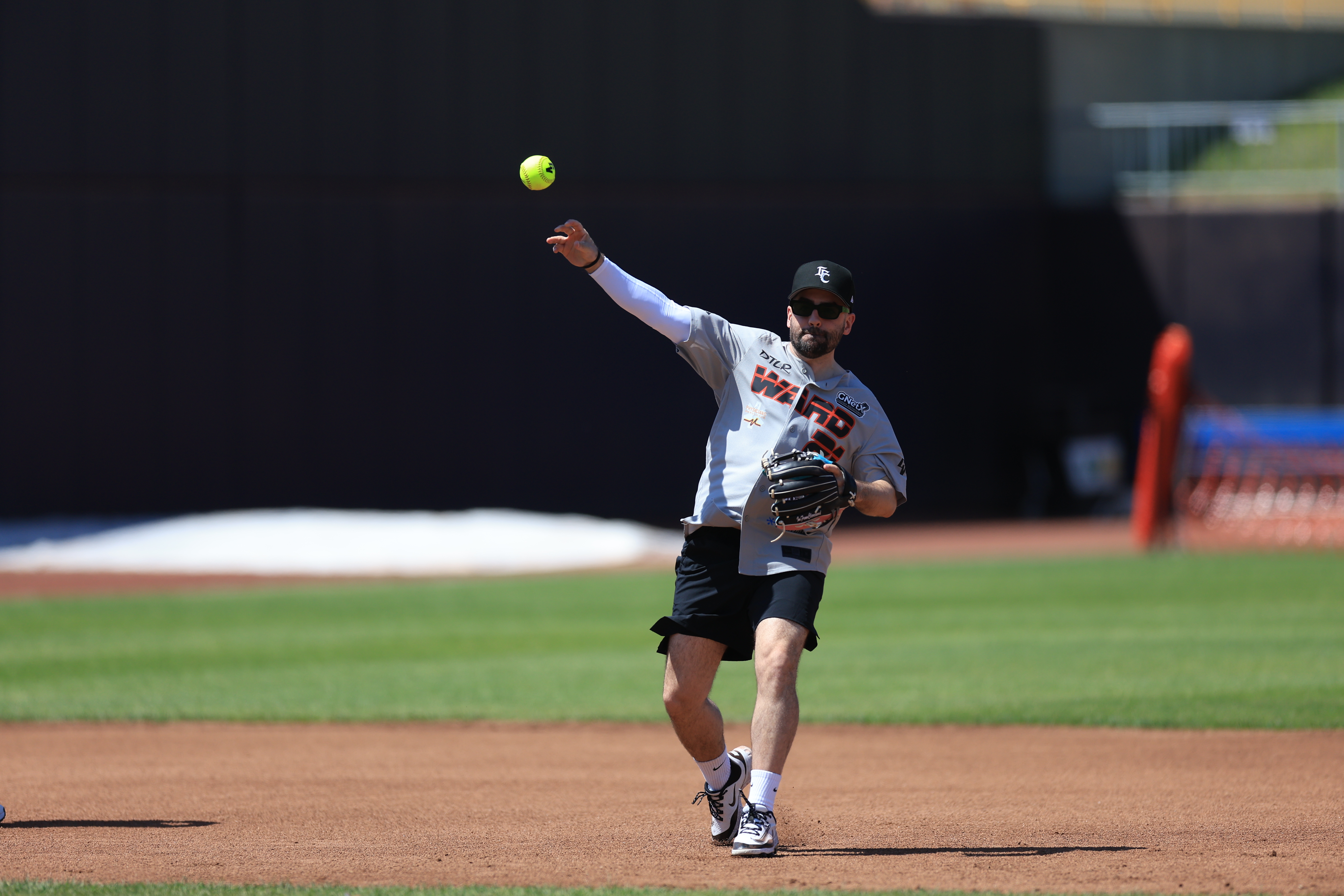 Photos from the Denzel Ward celebrity softball game, June 6,...