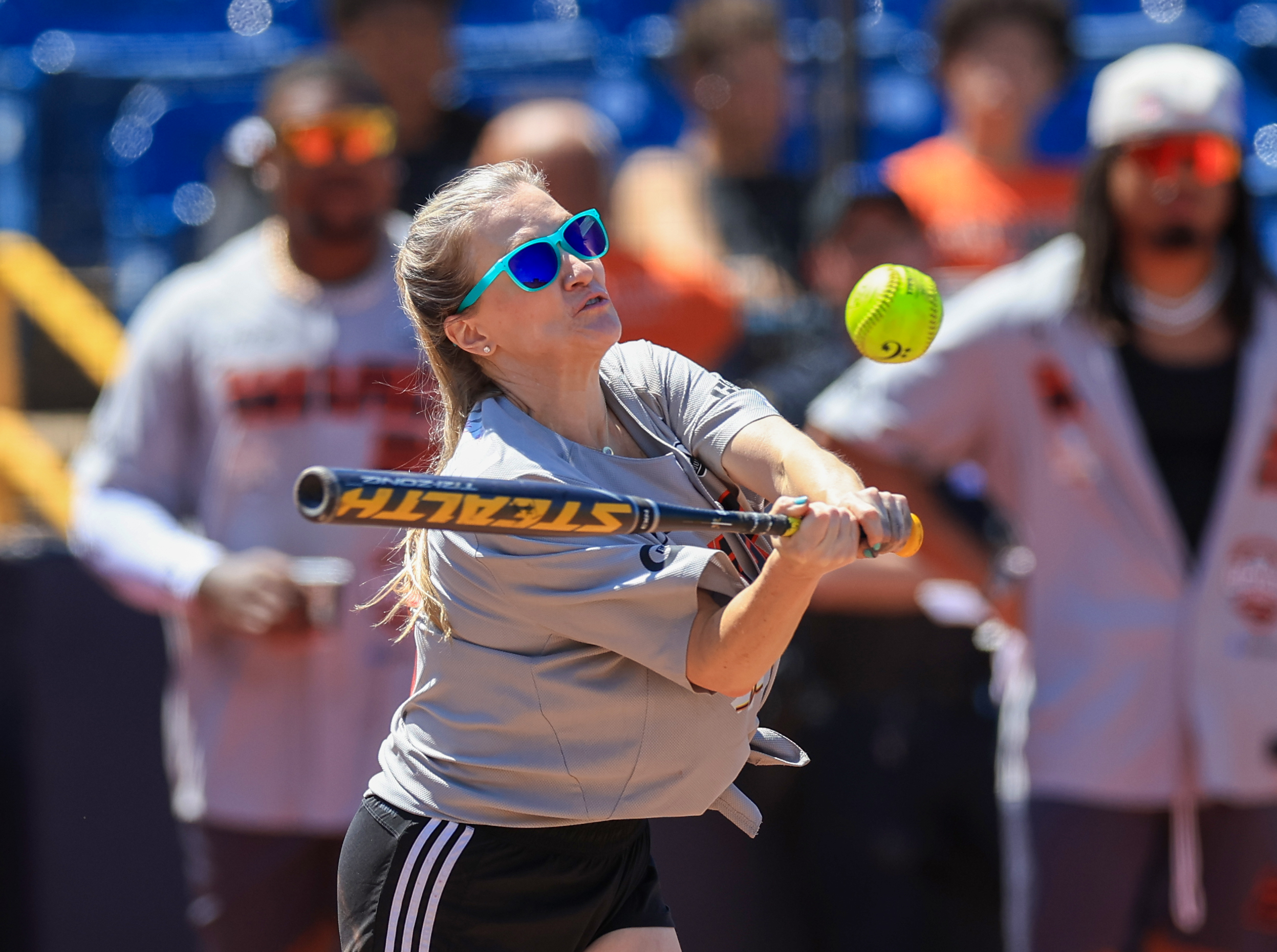 Photos from the Denzel Ward celebrity softball game, June 6,...