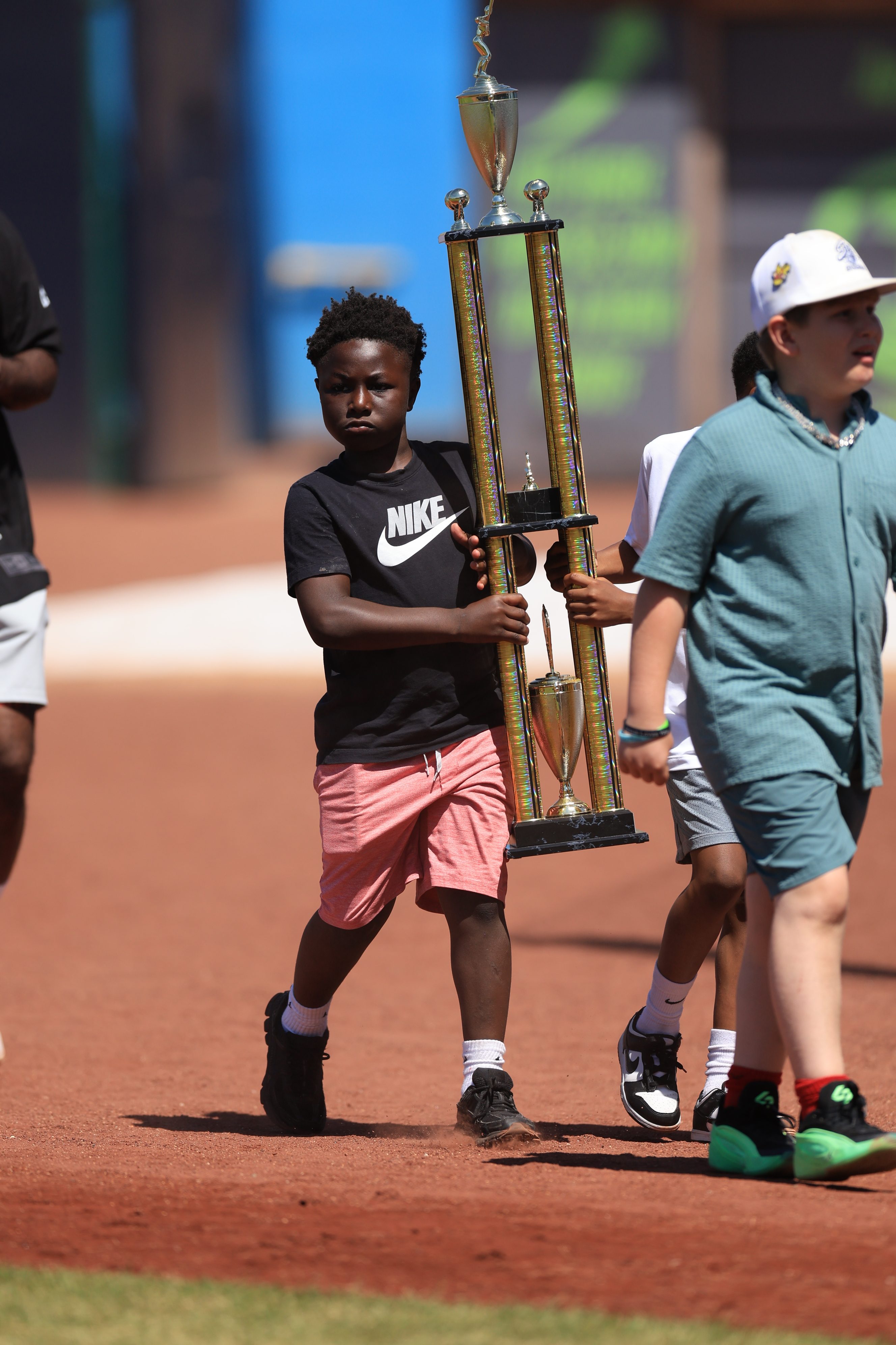 Photos from the Denzel Ward celebrity softball game, June 6,...