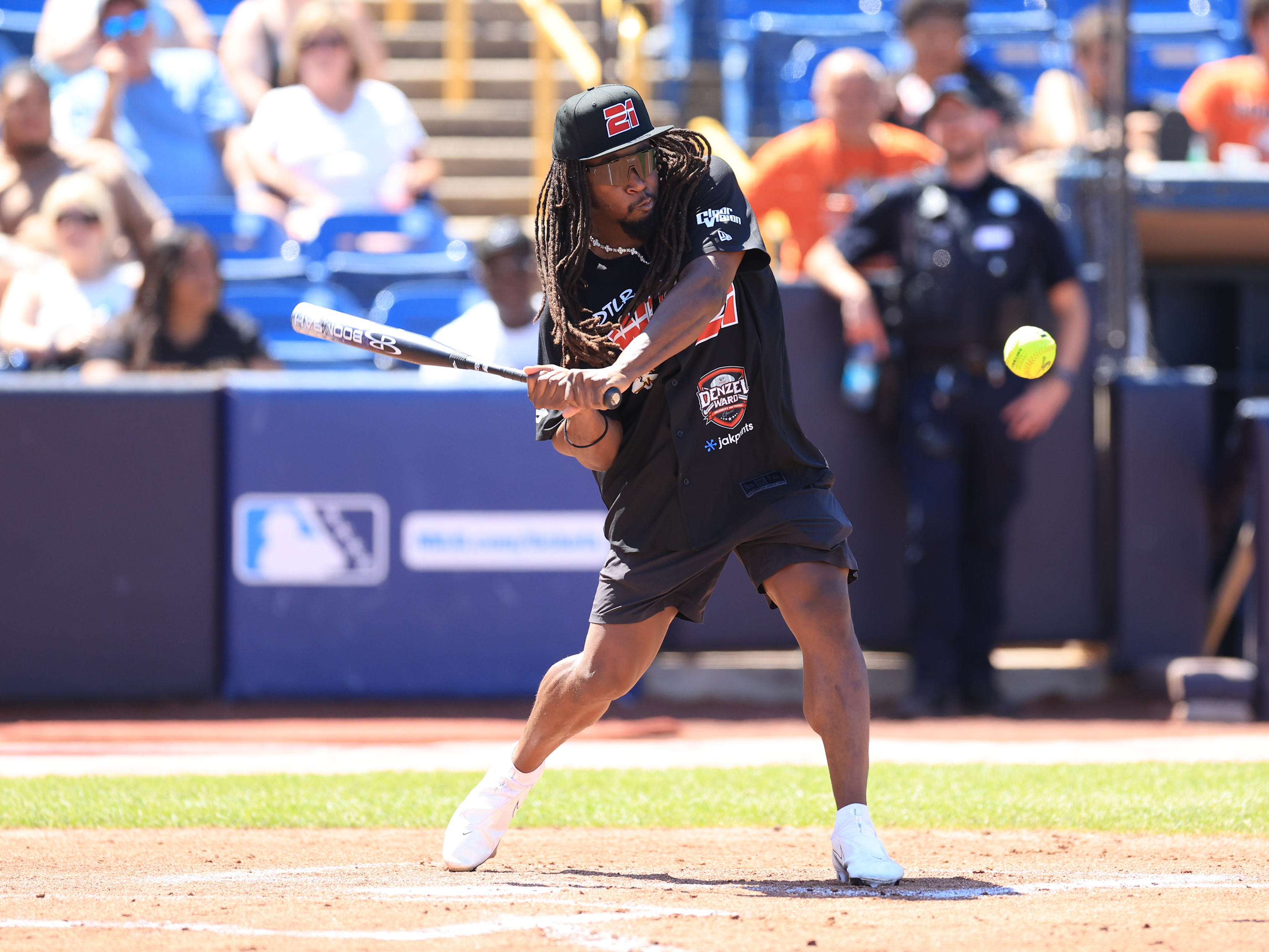 Photos from the Denzel Ward celebrity softball game, June 6,...