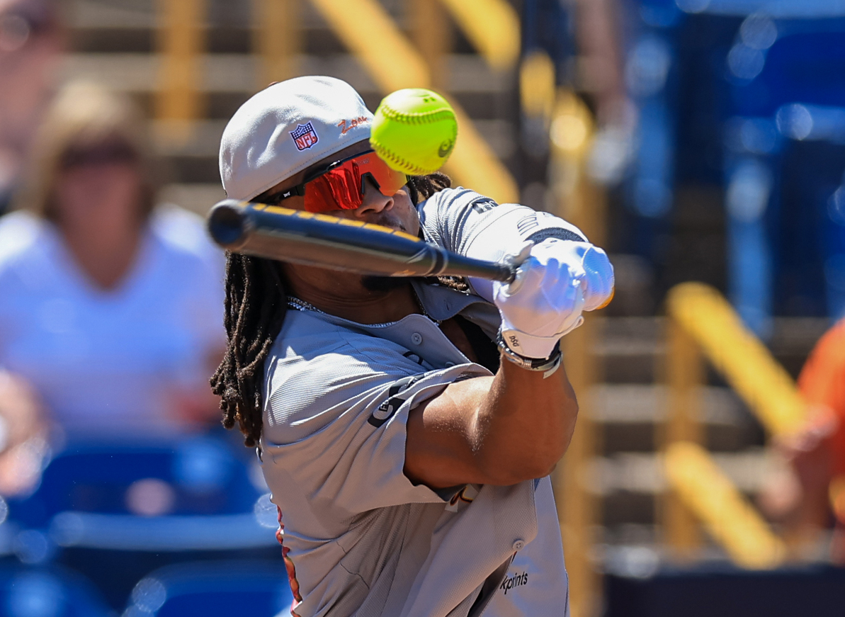 Photos from the Denzel Ward celebrity softball game, June 6,...
