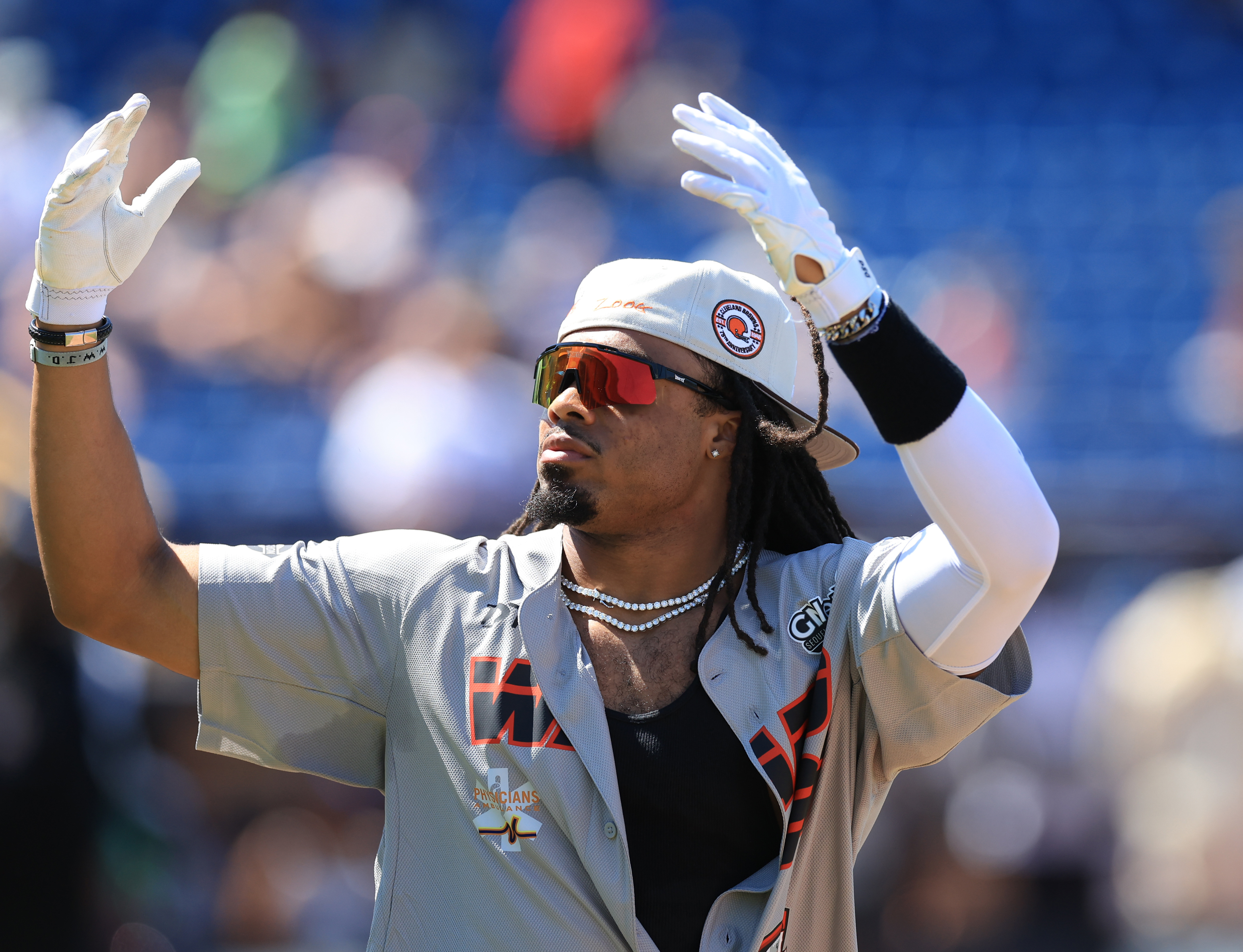 Photos from the Denzel Ward celebrity softball game, June 6,...