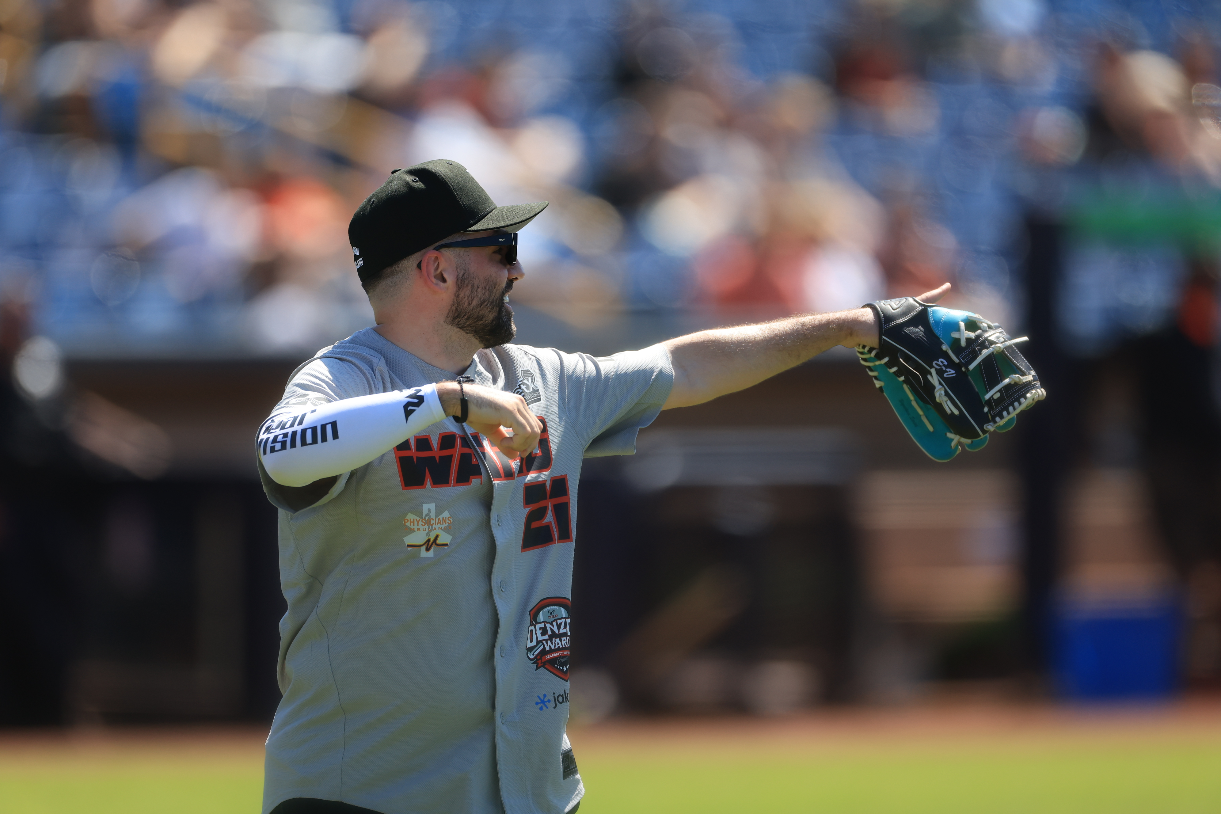 Photos from the Denzel Ward celebrity softball game, June 6,...