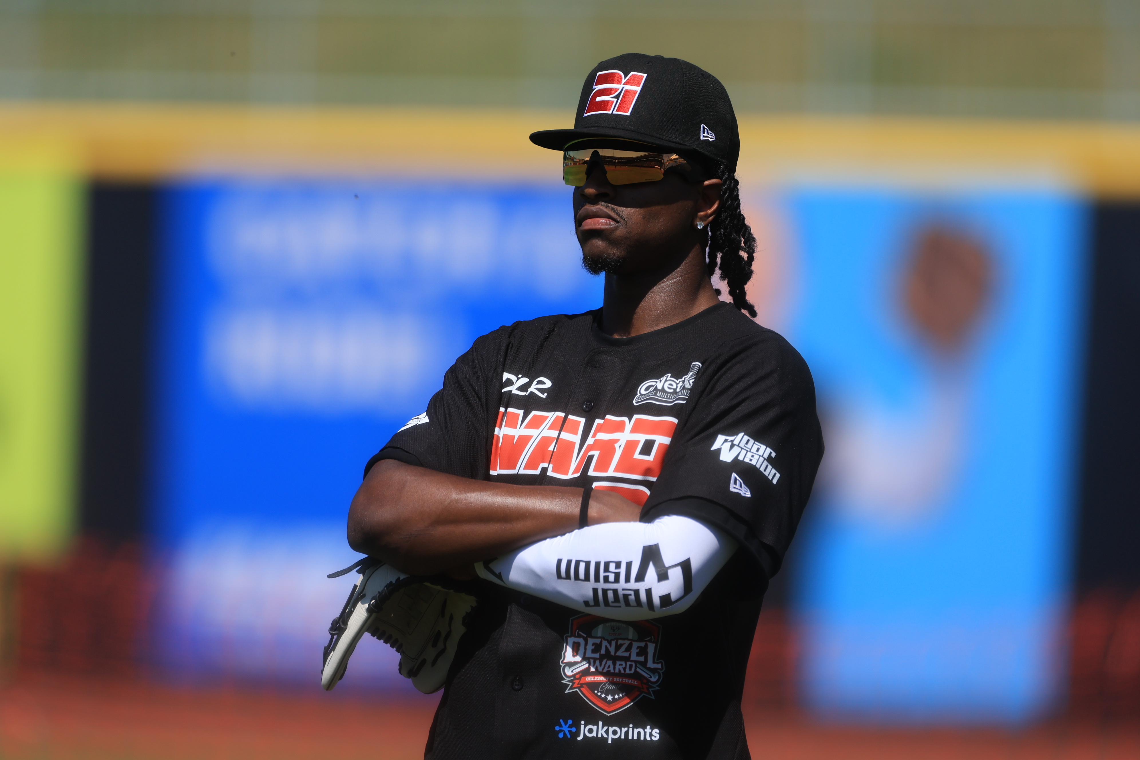 Photos from the Denzel Ward celebrity softball game, June 6,...