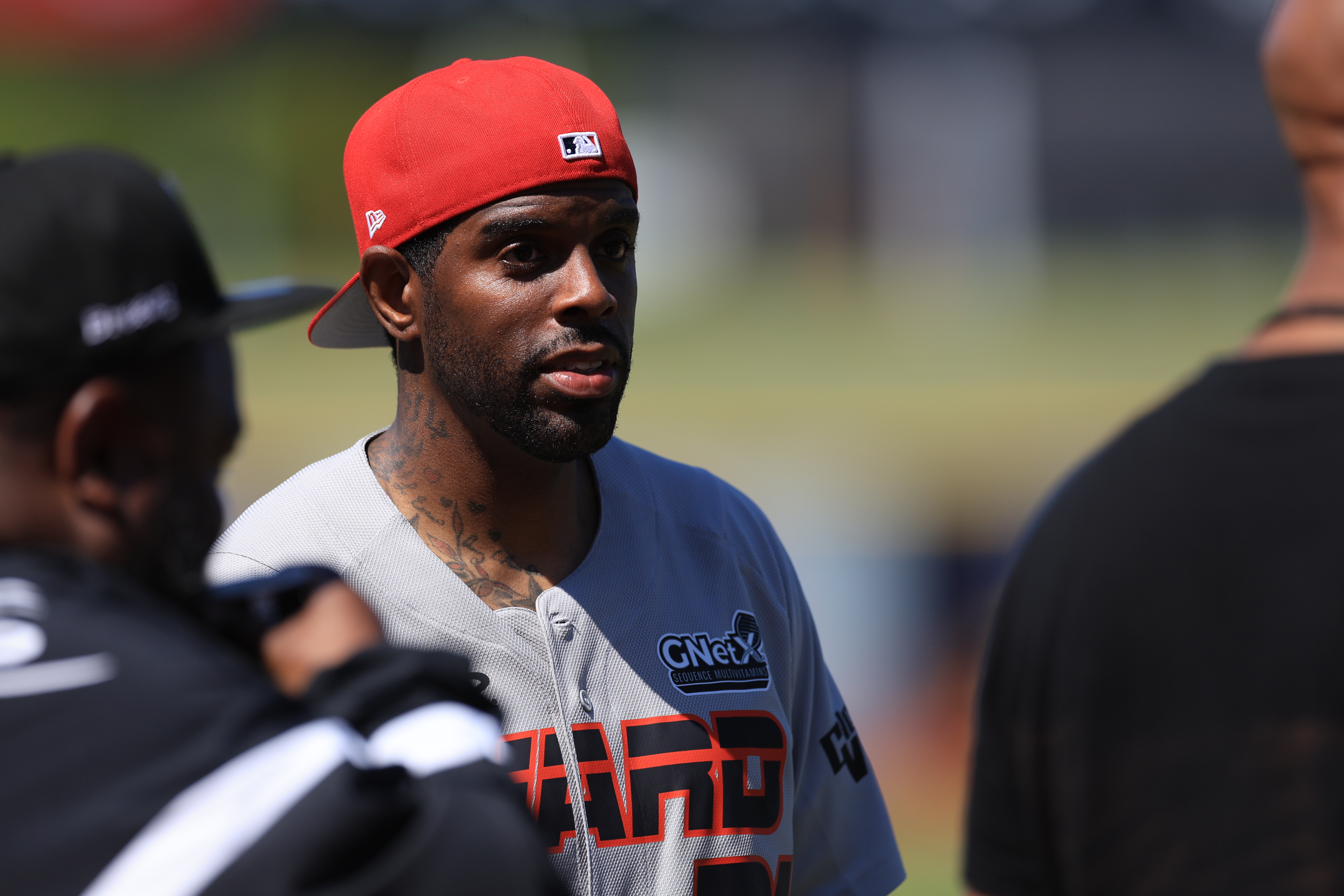 Photos from the Denzel Ward celebrity softball game, June 6,...