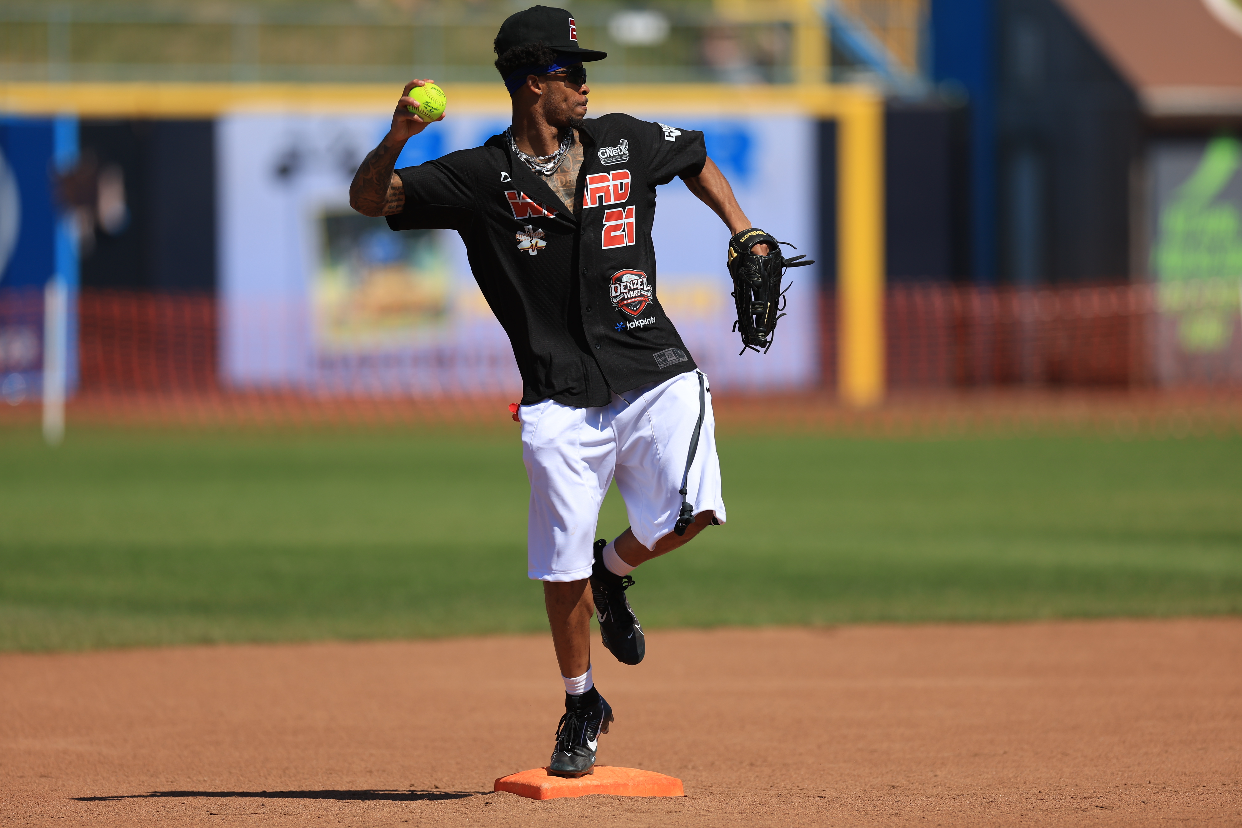 Photos from the Denzel Ward celebrity softball game, June 6,...