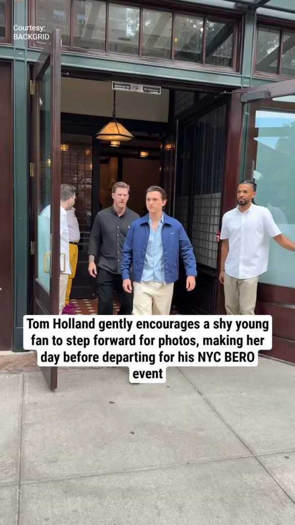Tom Holland encourages young fans to step forward so they can take a picture with him