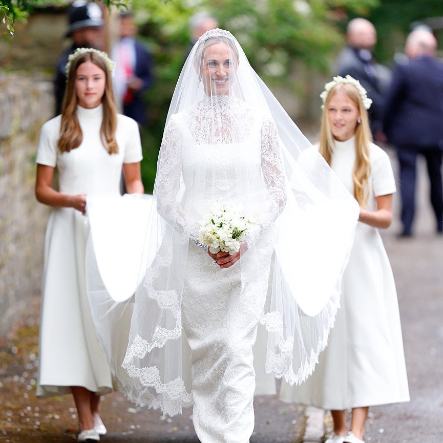 kemble, england june 06: (embargoed for publication in uk newspapers until 24 hours after create date and time) harriet sperling, accompanied by her bridesmaids daughter georgina sperling (l) and step daughter isla phillips (r), arrives at all saints church for her and peter phillips wedding ceremony on june 6, 2026 in kemble, england. peter phillips, son of princess anne, princess royal and eldest grandchild of queen elizabeth ii, will marry nhs nurse and writer harriet sperling during a ceremony at all saints church in kemble today. (photo by max mumby/indigo/getty images)
