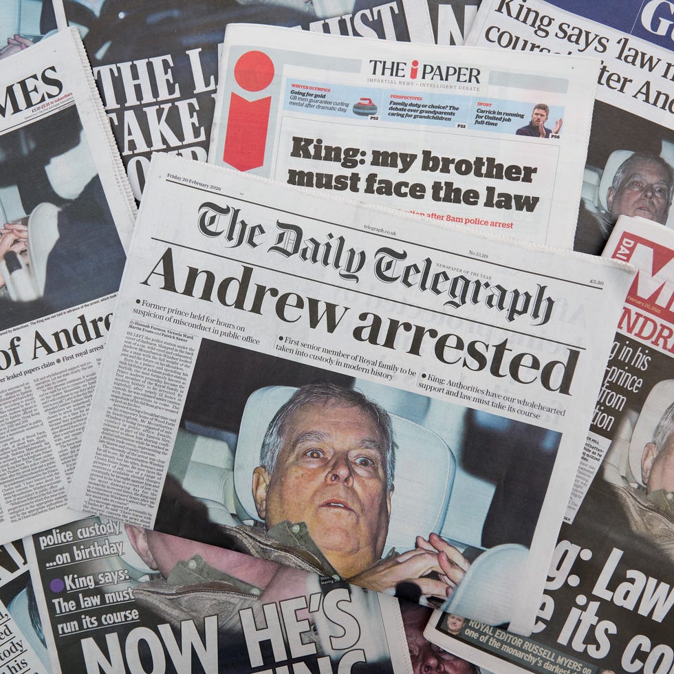 multiple british newspapers are displayed showing a front page image and accompanying story about andrew mountbatten windsor