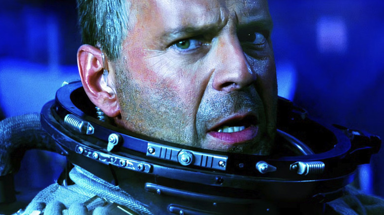 Harry Stamper (Bruce Willis) looks shocked in his spacesuit in Armageddon (1998)