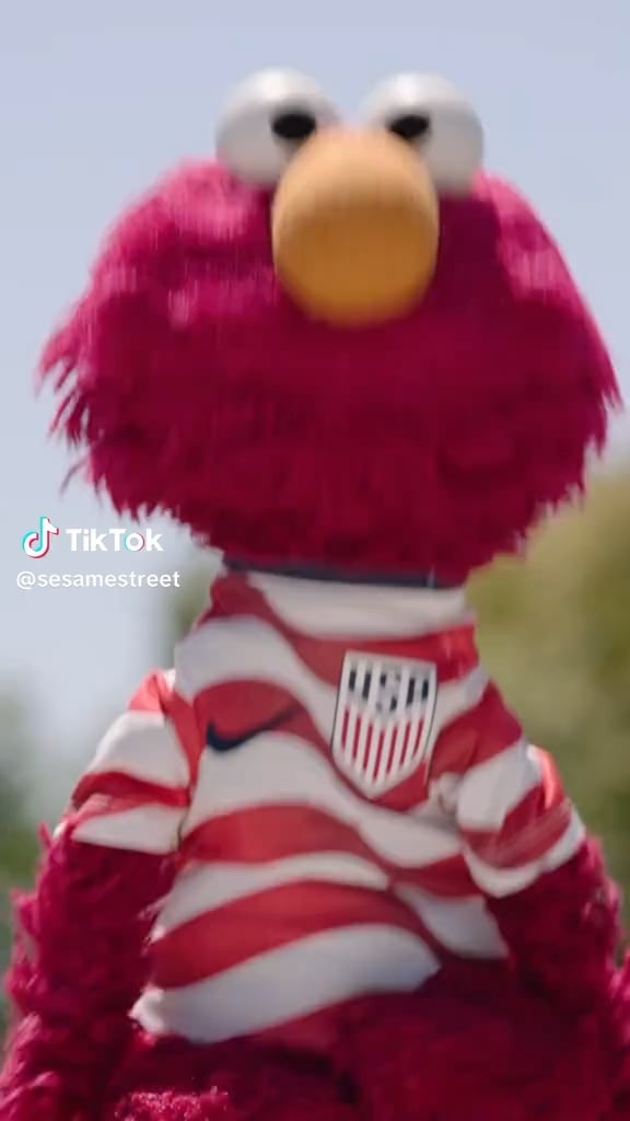 Elmo making it clear he is supporting the US in the World Cup after his questionable PR move of sitting on the fence for the NBA championship.