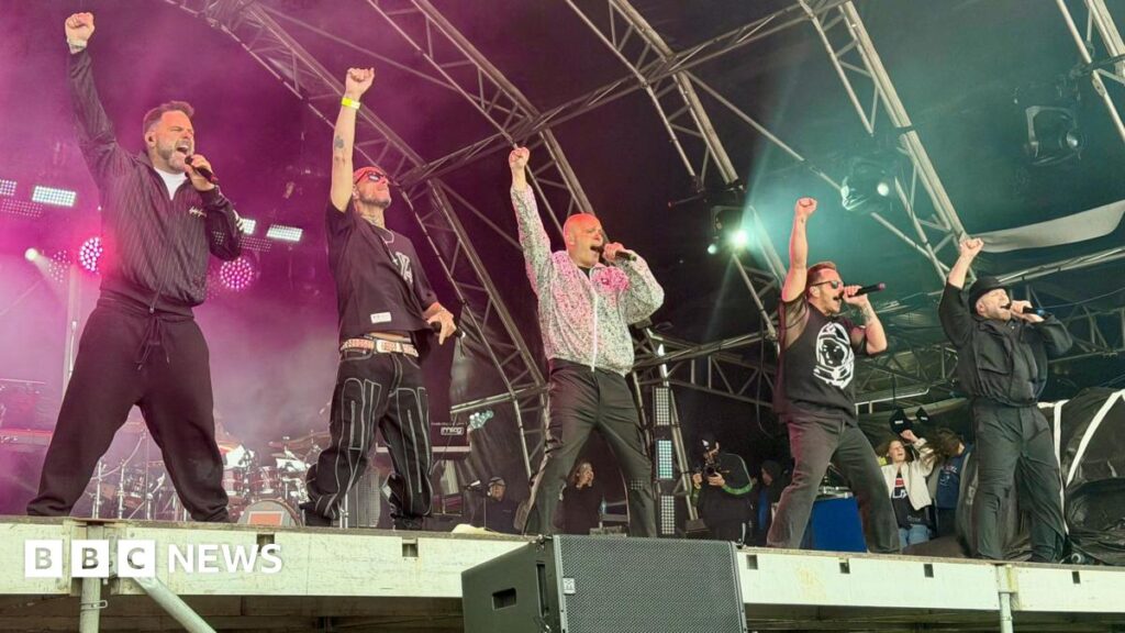 Weston-Super-Mare’s Summer Fest at the Beach day one in pictures Boy band Five, standing in a line on stage - all singing with their right arms in a fist in the air