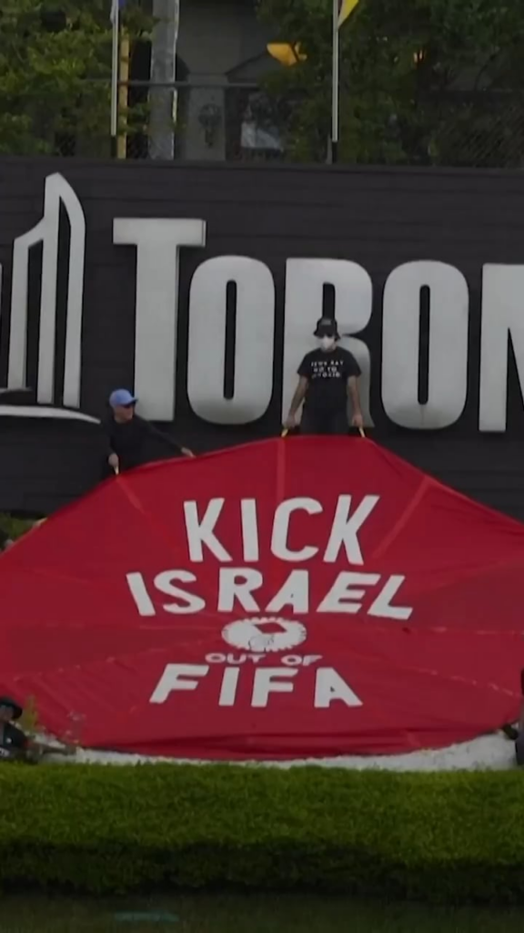 Activists covered the Fifa logo in Toronto with a banner reading "Kick Israel out of Fifa" on Friday, as Canada geared up for its first game of the 2026 World as one of the hosts. Faisal Ibrahim, an activist involved the protest, said it was to "call out double standards"