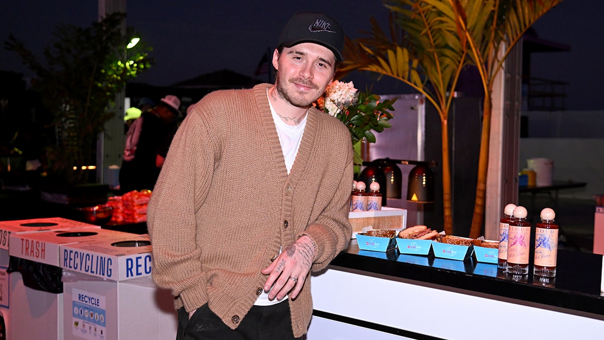 Brooklyn Peltz Beckham standing at South Beach Wine and Food Festival in Miami Beach, Fla.