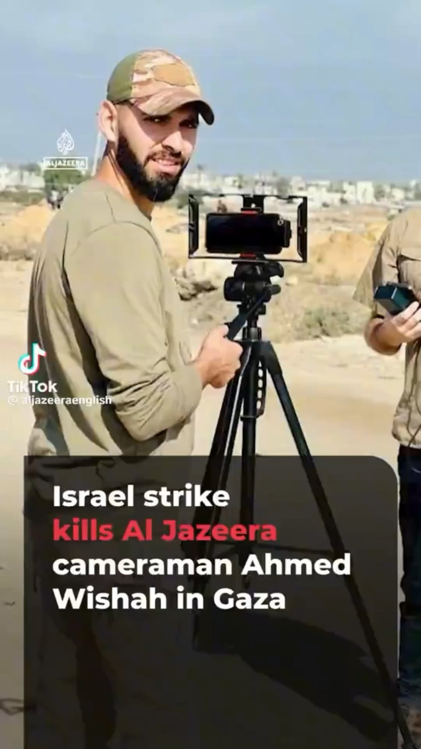 Israel continues killing journalists, their latest victim is Al Jazeera cameraman Ahmed Wishah, just two months after another targeted attack killed his brother and colleague Mohammed. Ahmed was killed alongside two others in a strike on a house in Gaza’s Bureij refugee camp. Israel continues killing journalists, their latest victim is Al Jazeera cameraman Ahmed Wishah, just two months after another targeted attack killed his brother and colleague Mohammed. Ahmed was killed alongside two others in a strike on a house in Gaza's Bureij refugee camp.