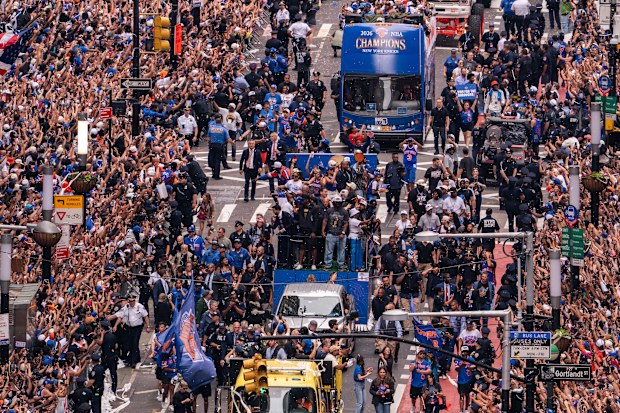 Thousands of fans gather in lower Manhattan for the New York Knicks Championship ticker-tape parade