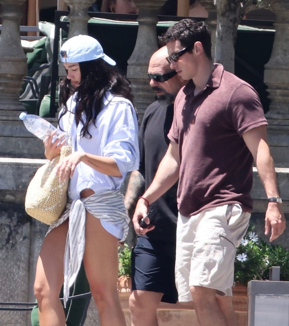 Dua Lipa and Callum Turner photographed in Palermo, Italy.