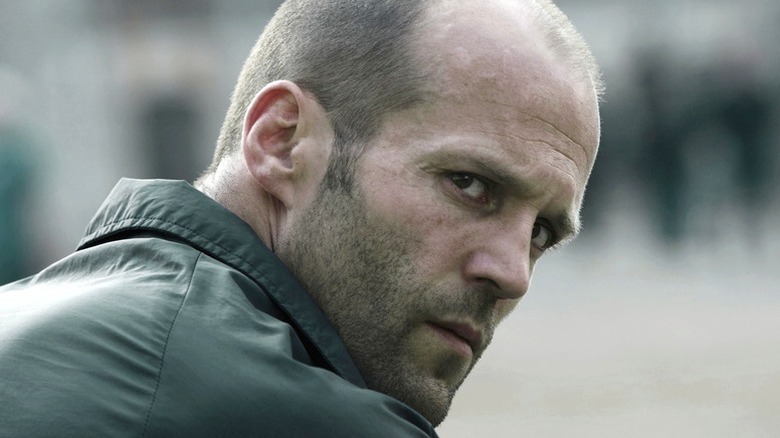 Jensen Ames (Jason Statham) looks back sternly in Death Race (2008)