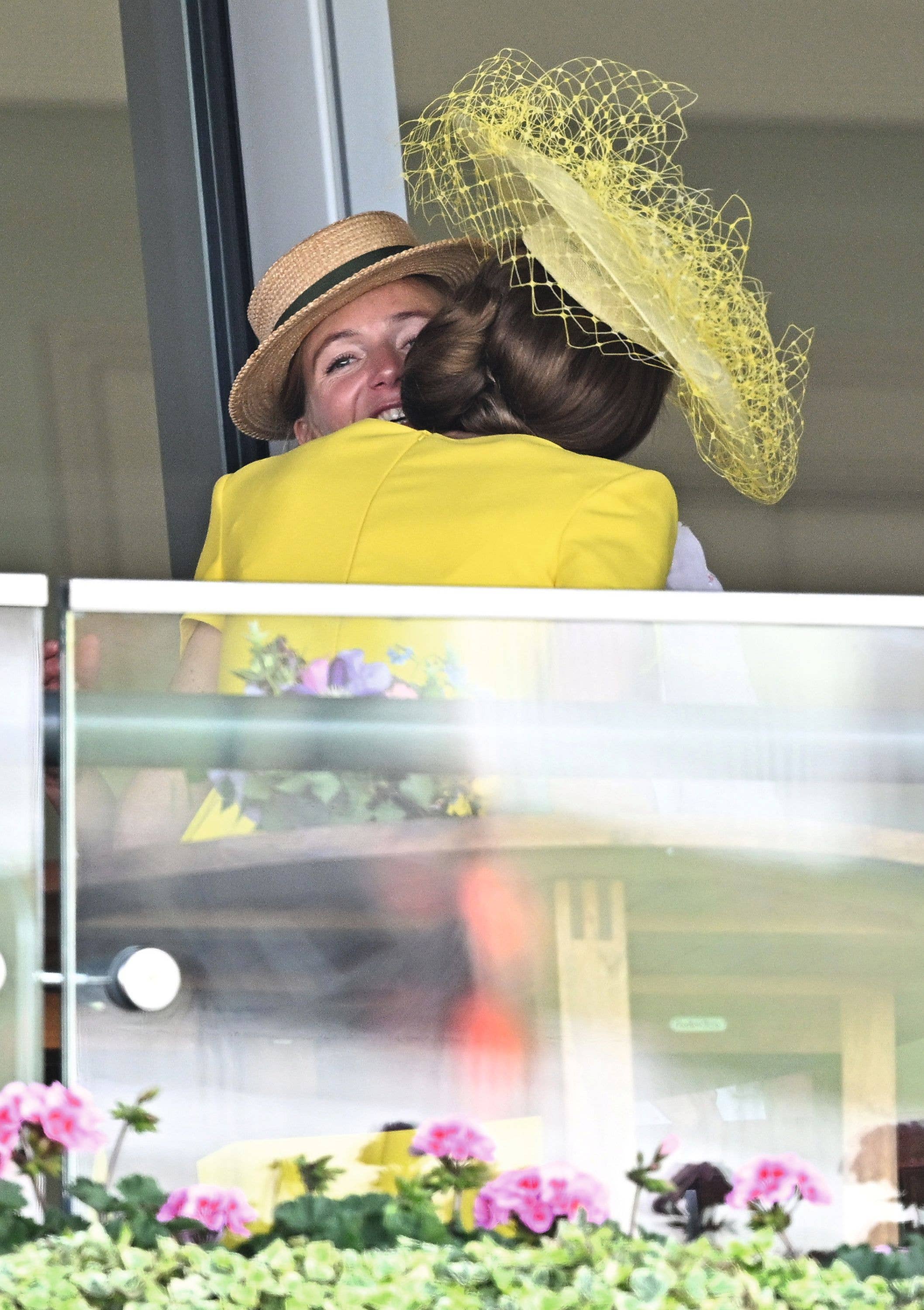 Catherine, Princess of Wales and Alizee Thevenet hug 