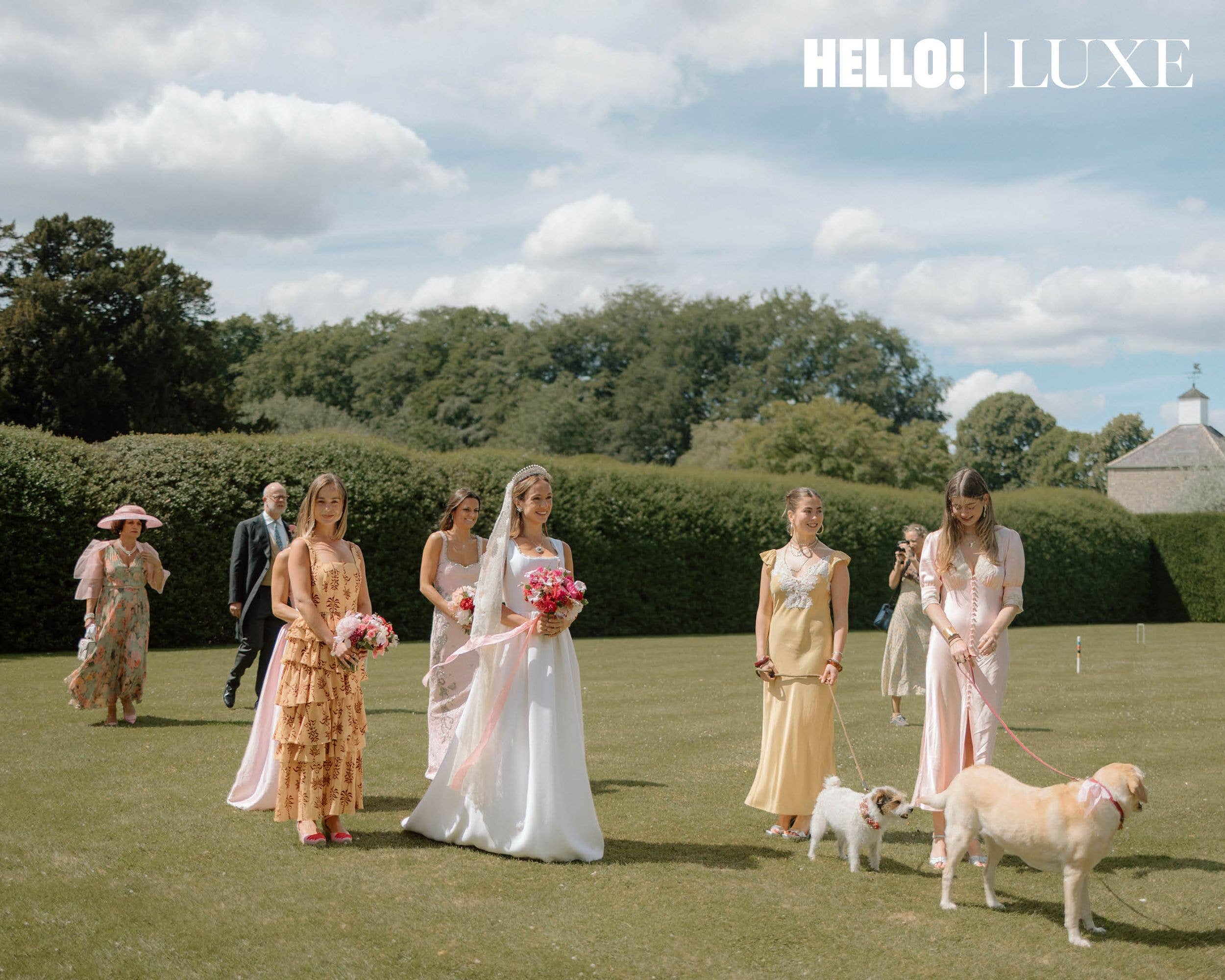 Estella and Eloise help to exercise Gyda and Bramble – two of the three family dogs that took part in the ceremony