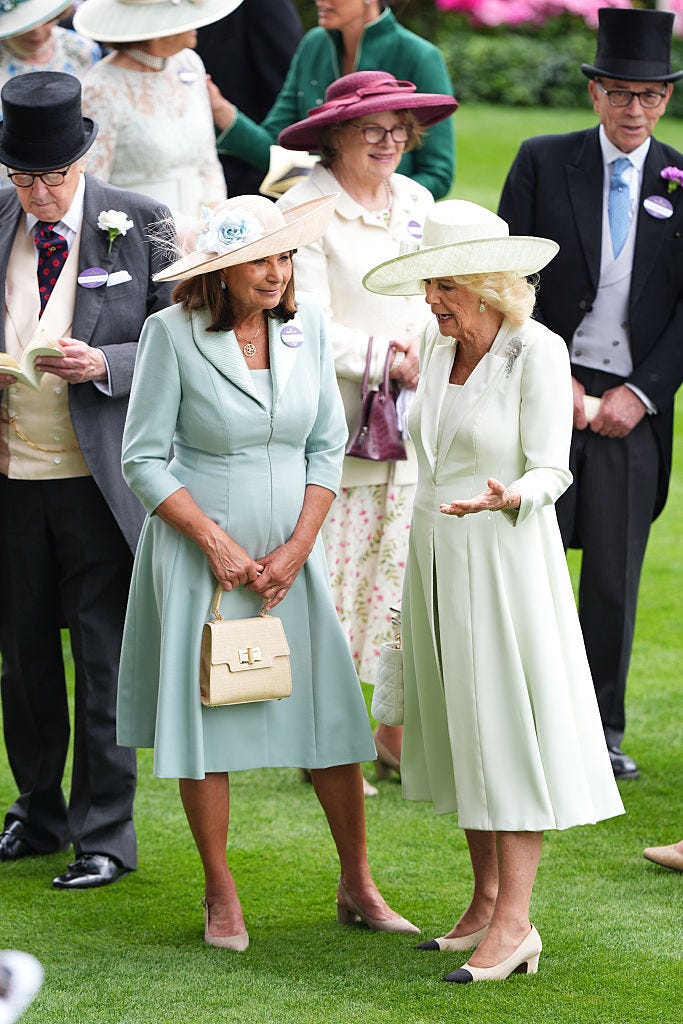 queen camilla right talks with carole middleton on day three of royal ascot at ascot racecourse, berkshire picture date thursday june 18, 2026 photo by aaron chownpa images via getty images