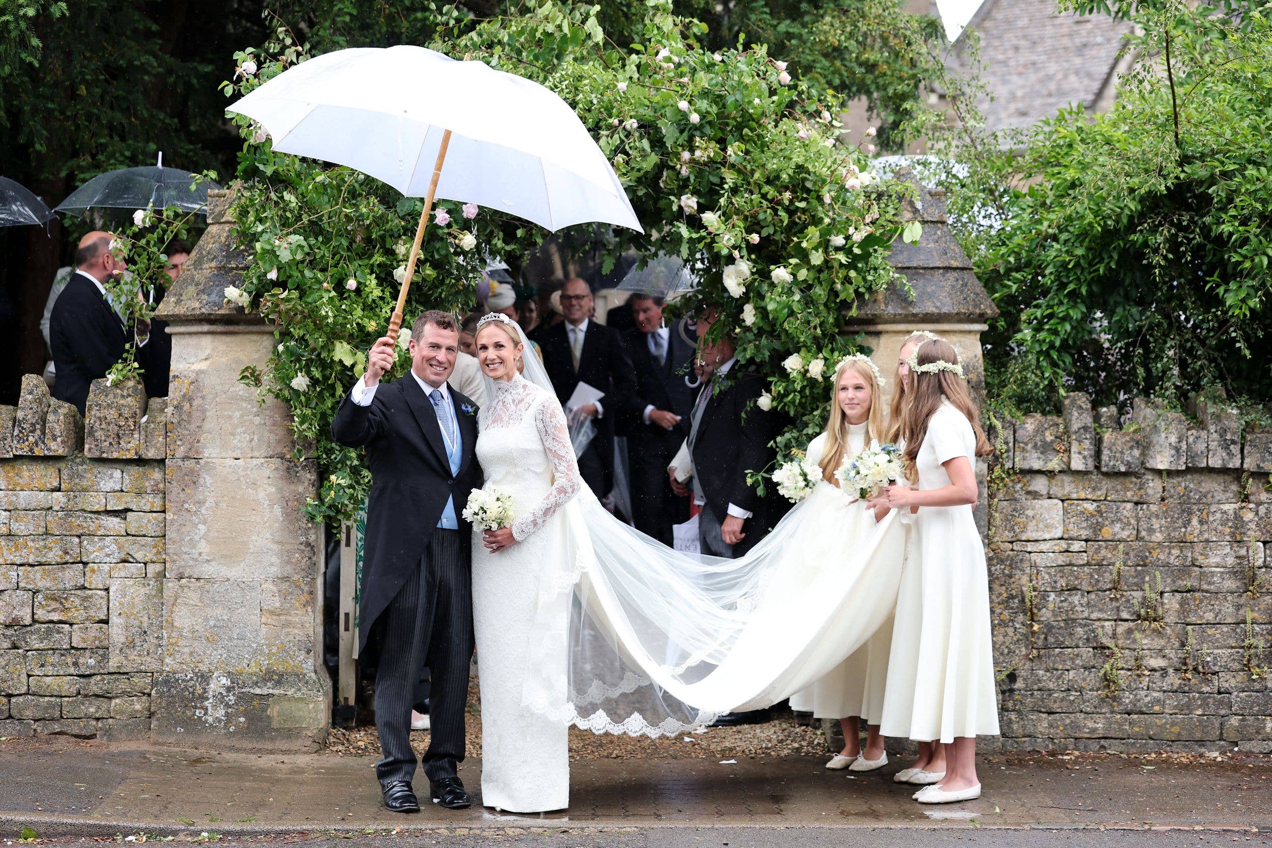 Peter Phillips and Harriet Sperling depart from their Royal wedding alongside bridesmaids Georgina Sperling, Savannah Phillips and Isla Phillips at All Saints' Church